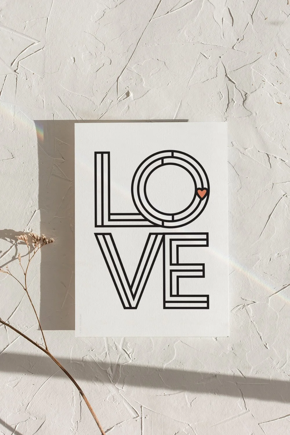 A clean and simple Mondrian insprired art print depicting the word “LOVE”. Classic black and white colors scheme with a touch of soft red for the heart. Frame not included.