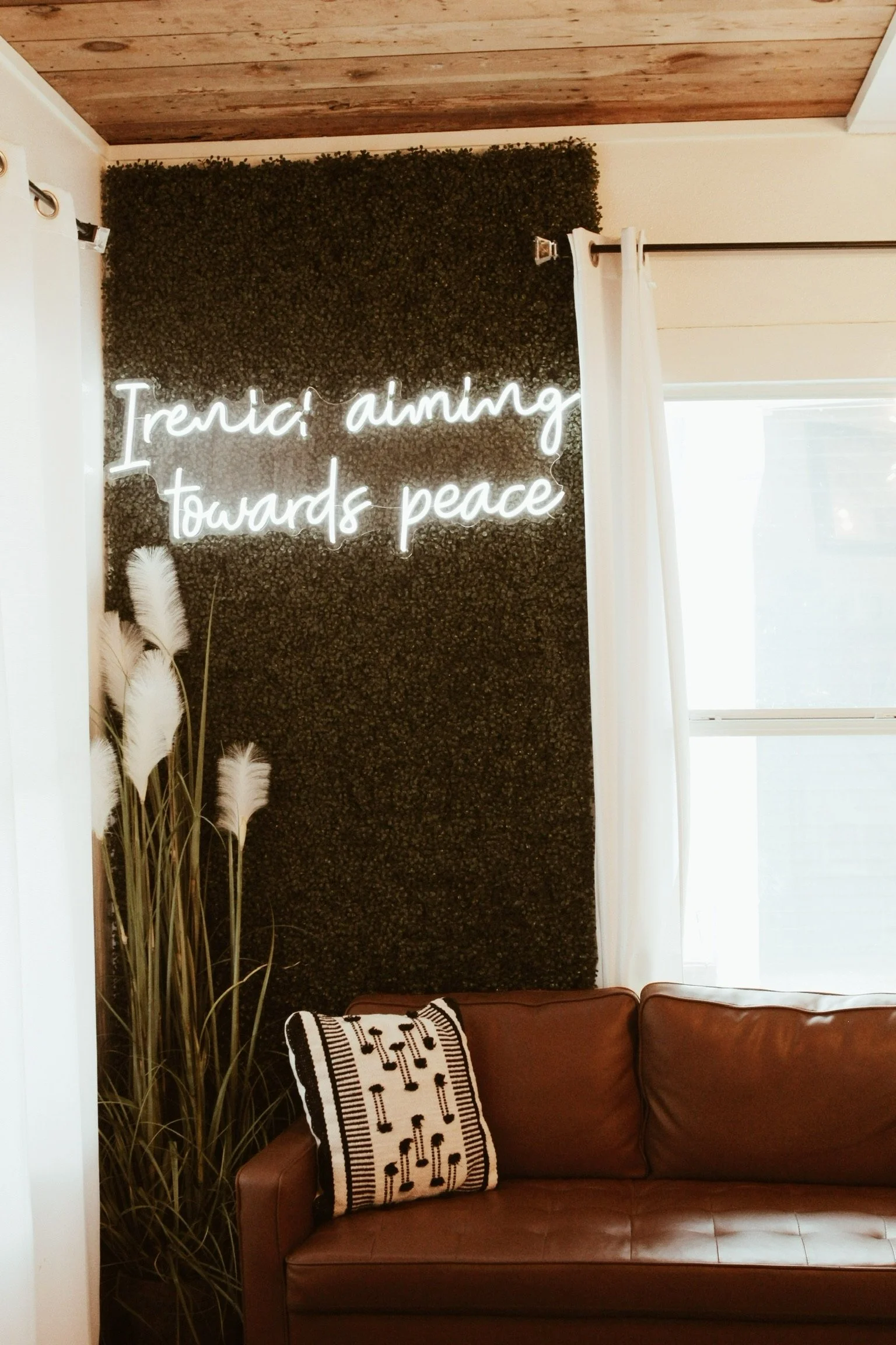 Reception sign saying Irenic means aiming toward peace in Aledo, Texas