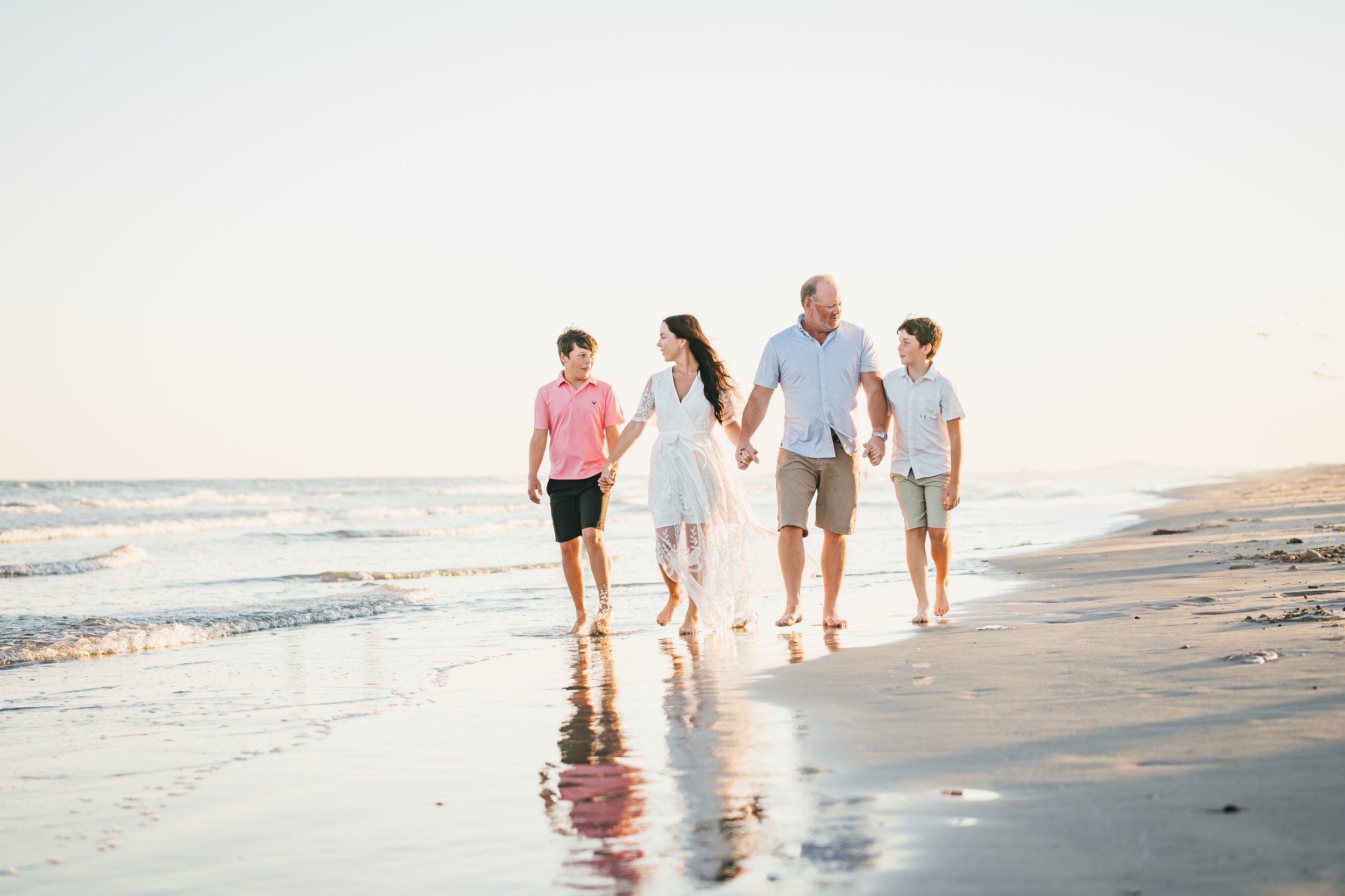 Mom and dad walking on the beach after searching for answers and creating The Irenic Place in Aledo, Texas for IV vitamin infusion, injection, ozone and functional lab work