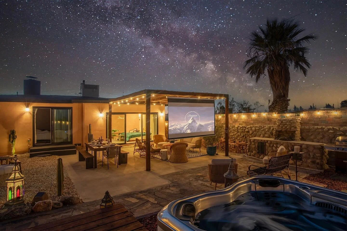 I love desert homes. This short term rental in Joshua Tree had a Moroccan decor and an amenity stocked backyard complete with a movie screen/projector, sauna, hot tub, hammock, 2 fire pits, an outdoor shower, dining table, yoga patio, cowboy tub and 