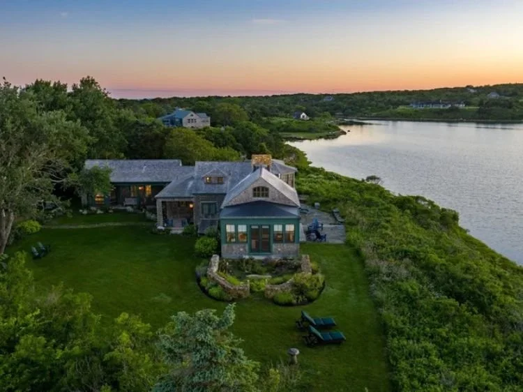 Color photo of a home in Chilmark, Martha's Vineyard, Stonewall Pond - with a beautiful Sunset overlooking the ocean.