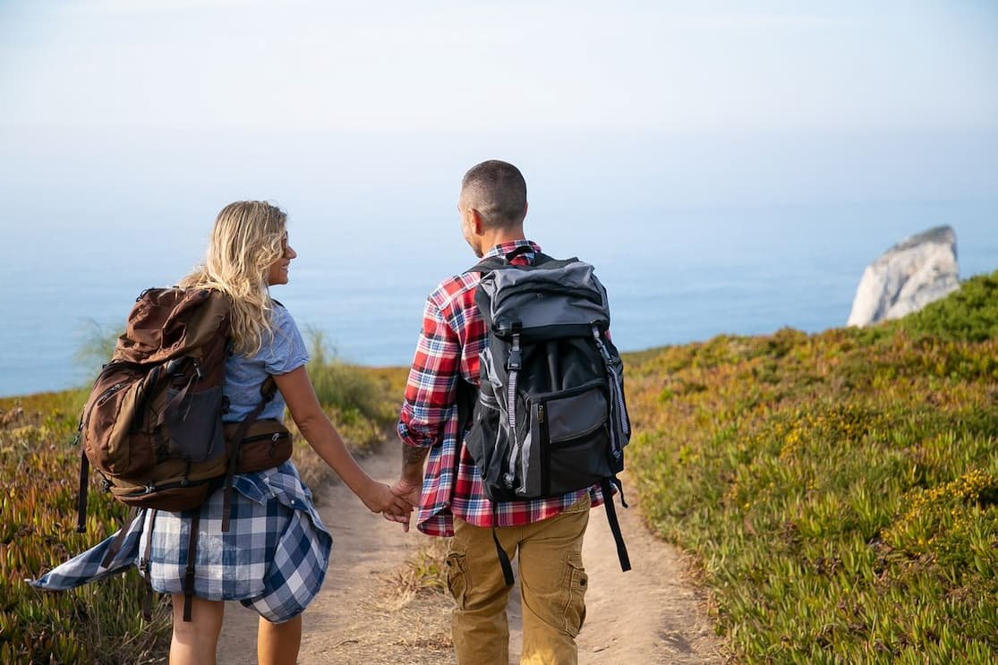 couple-hiking-in-the-wild