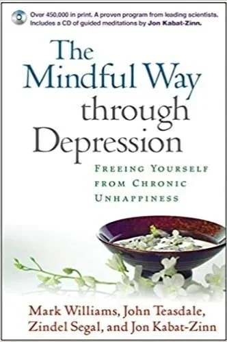 Book cover for The Mindful Way Through Depression: Freeing Yourself from Chronic Unhappiness by Mark Williams, John Teasdale, Zindel Segal, and Jon Kabat-Zinn, featuring a bowl of rice and flowers.