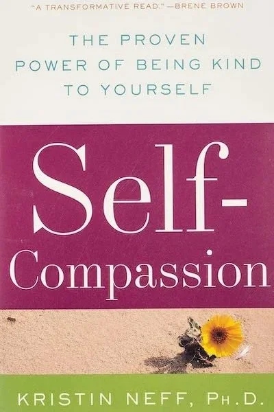 Book cover of Self-Compassion by Kristin Neff, Ph.D., featuring a yellow flower on sand and the subtitle “The Proven Power of Being Kind to Yourself.”