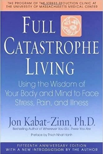Book cover of Jon Kabat-Zinn’s "Full Catastrophe Living," about using the wisdom of body and mind to manage stress, pain, and illness.