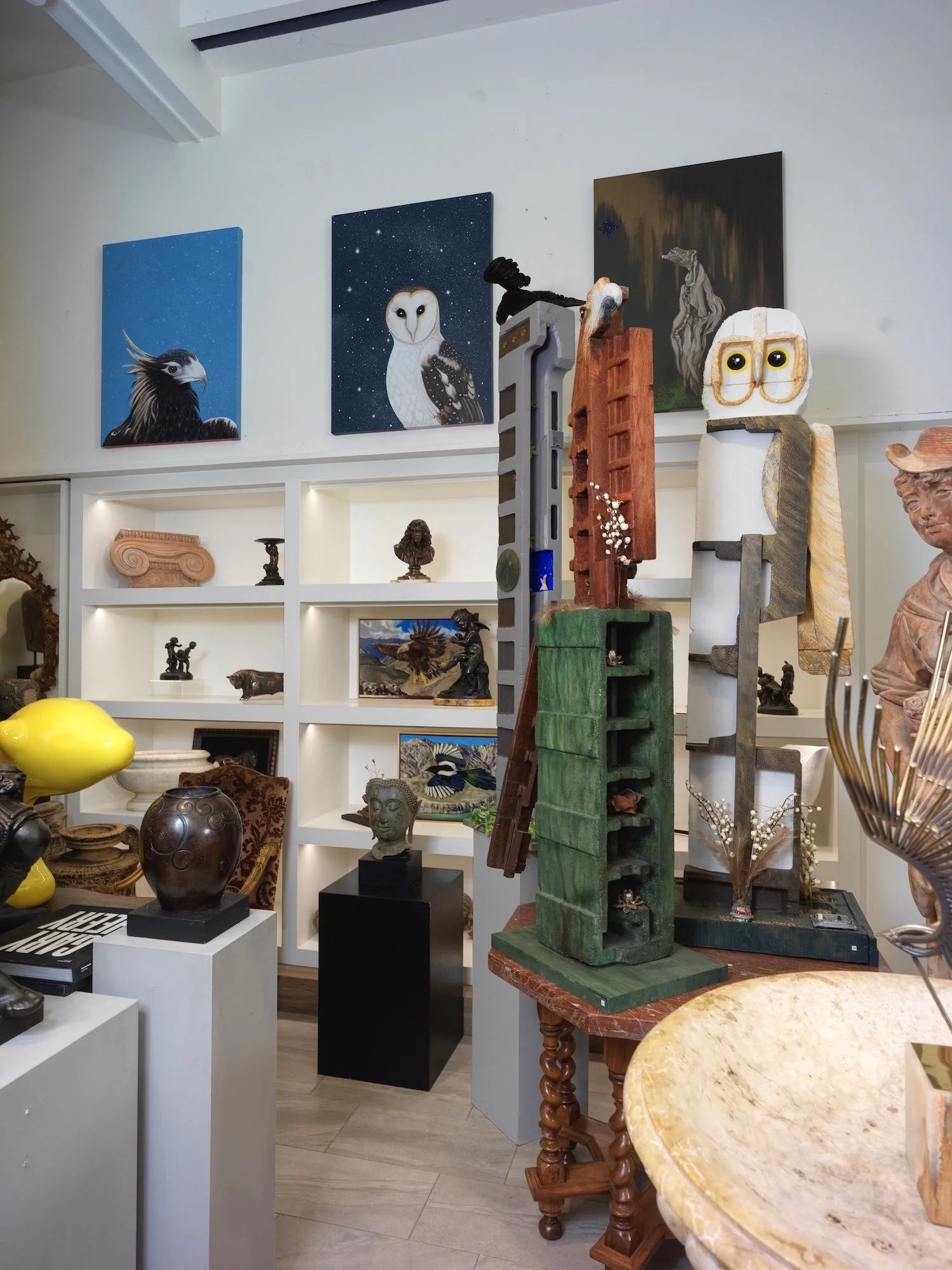 Inside Installation of my recycled polystyrene bird sculptures The Gathering & three Amy paintings back wall