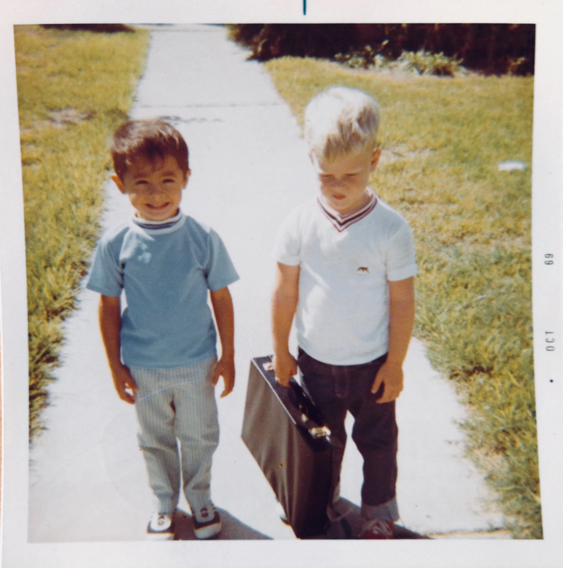 With my best friend Jim growing up in Harlingen, Texas. I was pensive as usual. I wonder what was in the briefcase? 