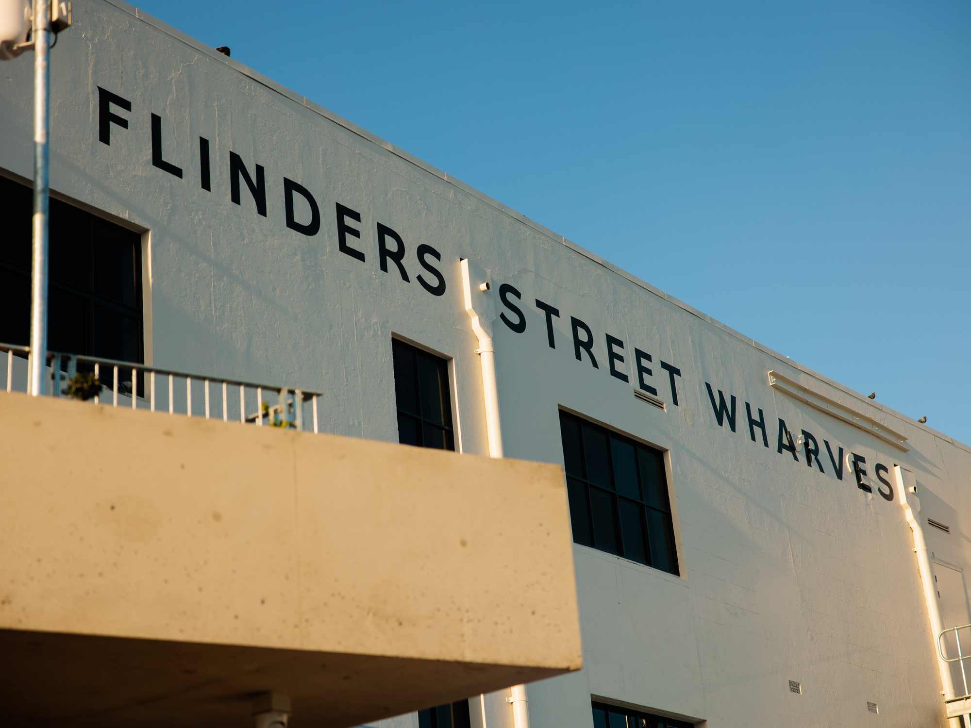 flinders street wharves townsville signage