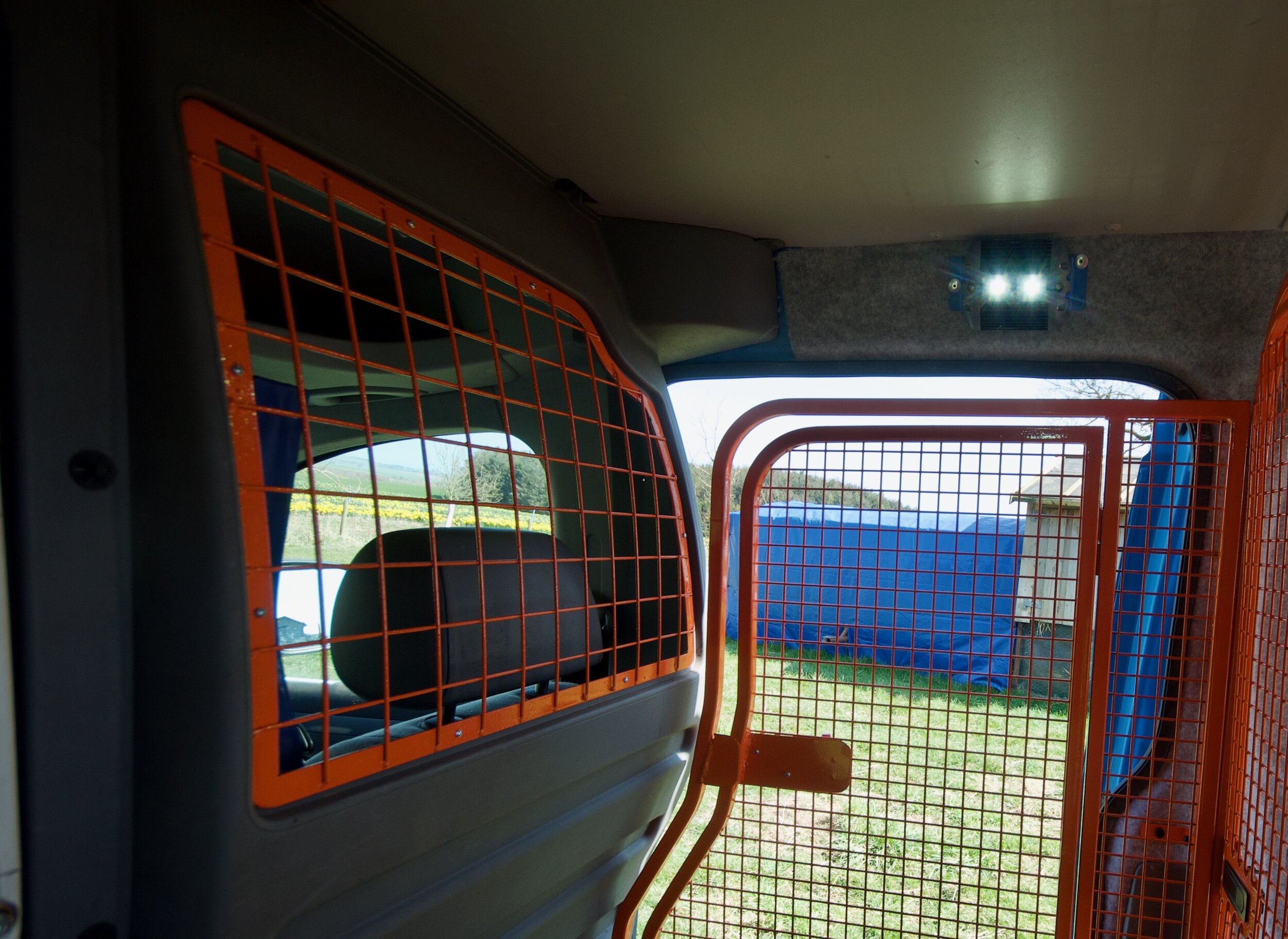 The grid behind the drivers seat to allow free passage of air and biscuits, mainly biscuits
