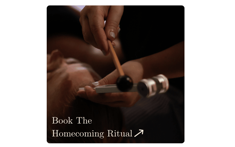 Sound healing being preformed with a tuning fork. Blue Moon wellness spa Cobbitty