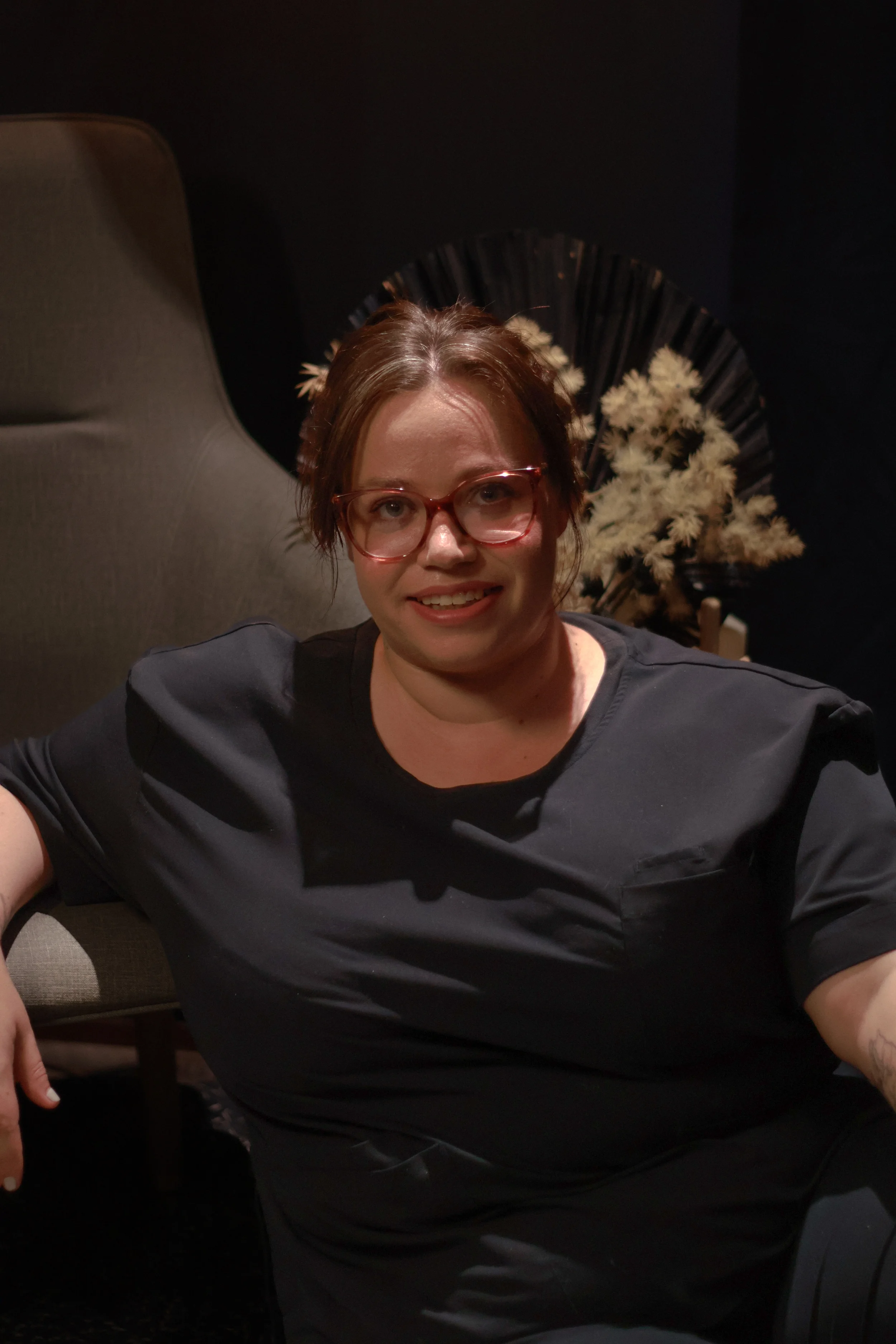 photo of liz sitting in treatment room cobbitty near Camden NSW