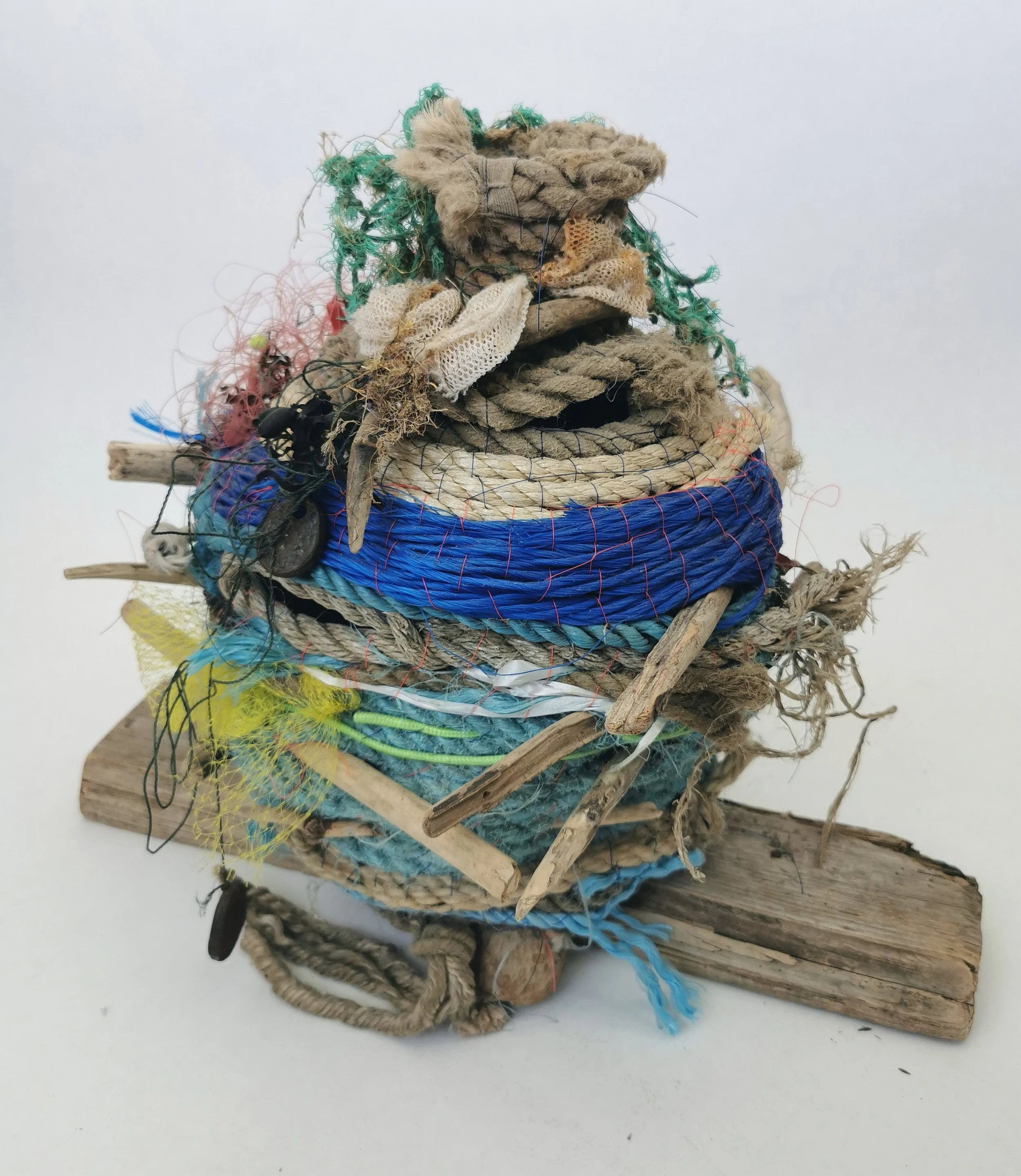 'Ocean Going Vessels' are a series of vases and jugs created entirely from found rope and other flotsam and jetsam found near the artists home and internationally. 