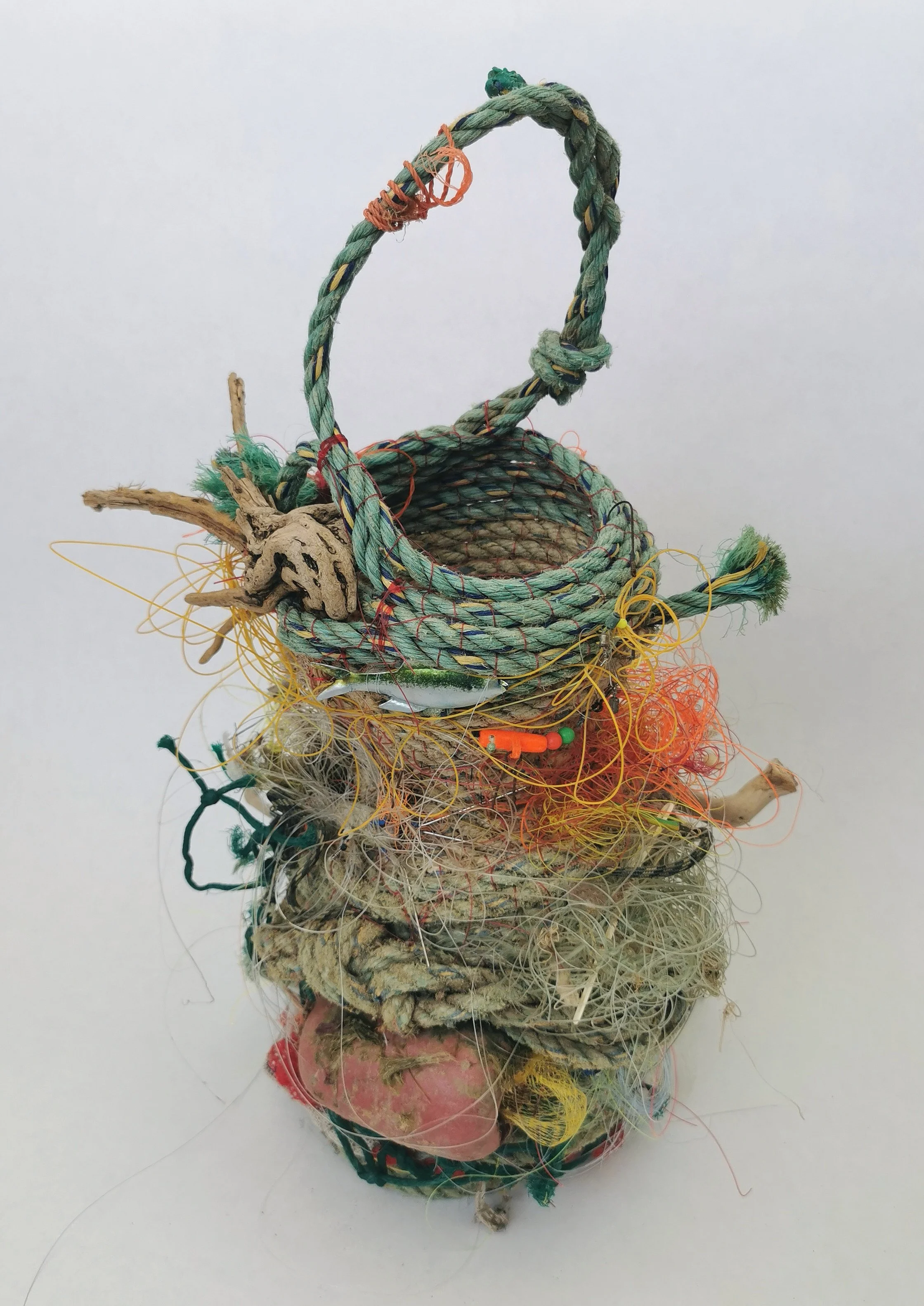 'Ocean Going Vessels' are a series of vases and jugs created entirely from found rope and other flotsam and jetsam found near the artists home and internationally. 