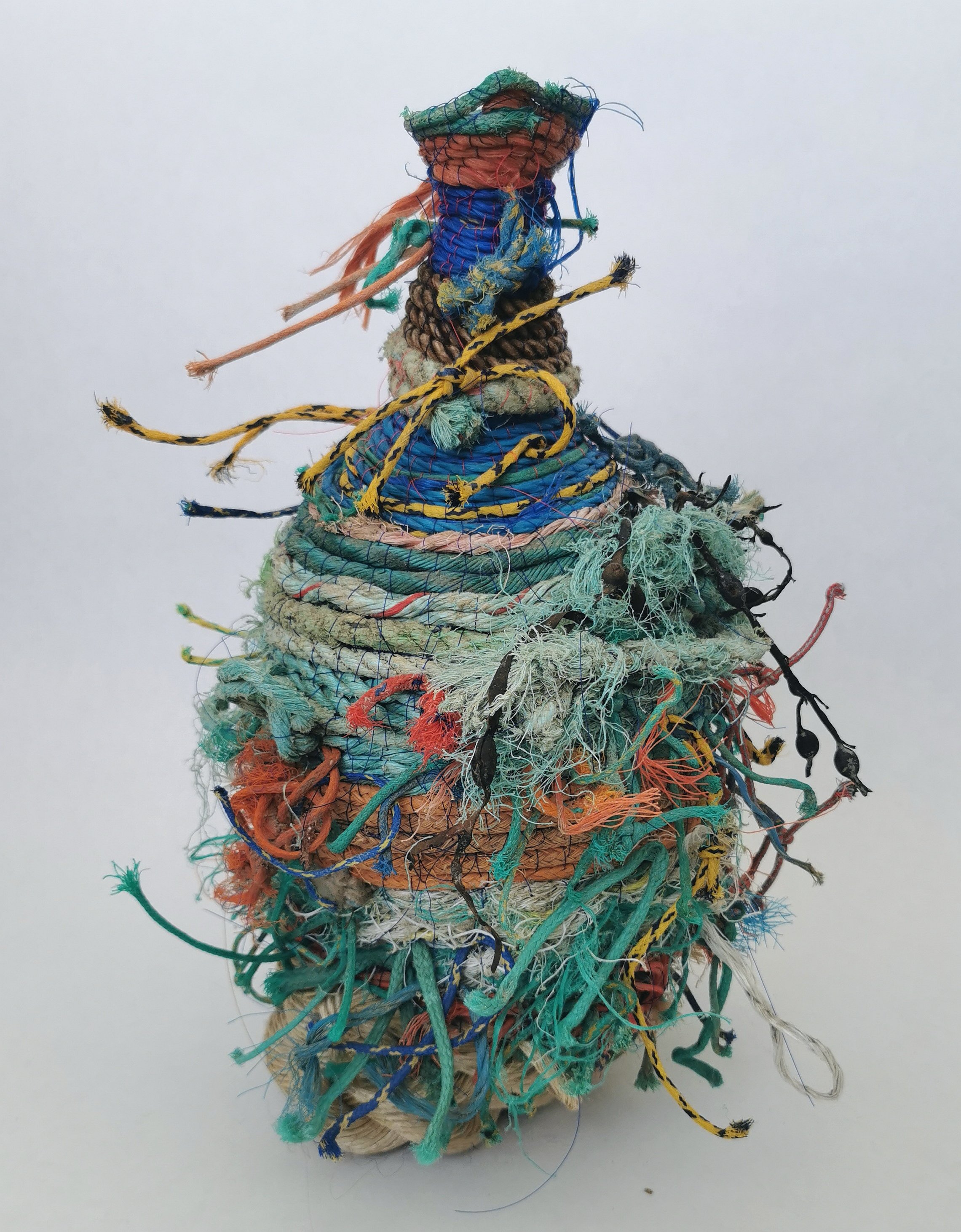 'Ocean Going Vessels' are a series of vases and jugs created entirely from found rope and other flotsam and jetsam found near the artists home and internationally. 