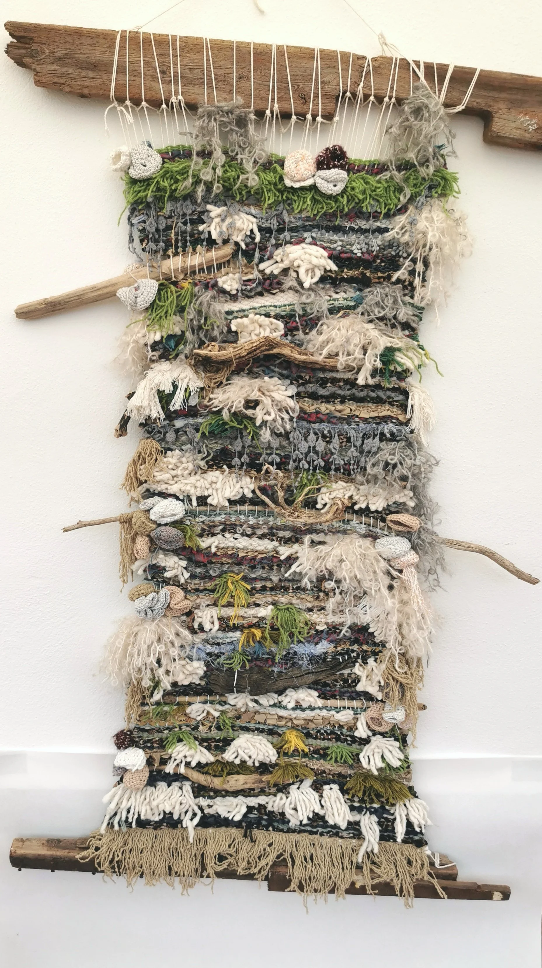 'Weaving Migrants' A year long research into the artists ancestors, from ancient royalty  to the Huguenot weavers. 
Image: Marsh. Woven recycled fabric scraps, yarn and found object. 