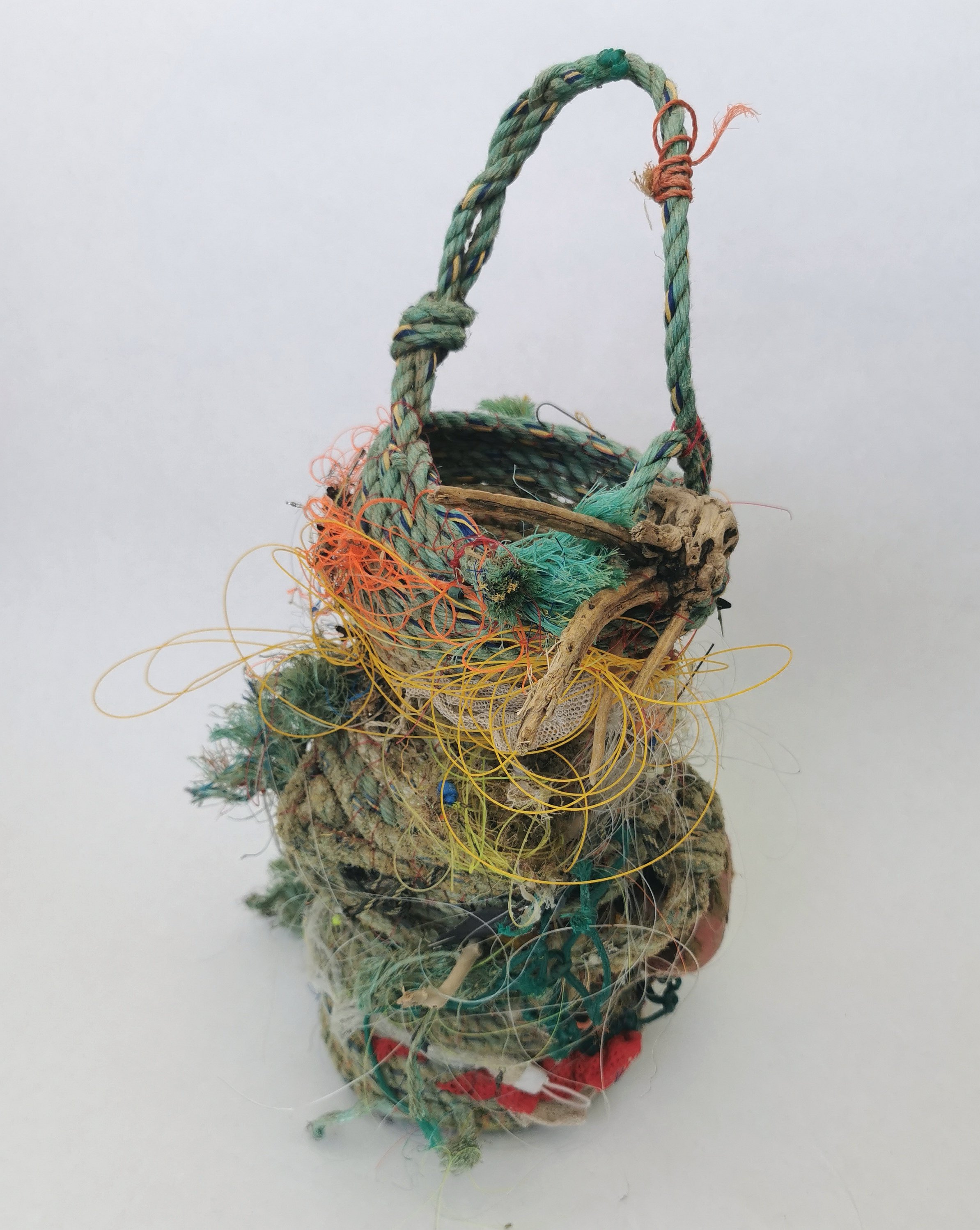'Ocean Going Vessels' are a series of vases and jugs created entirely from found rope and other flotsam and jetsam found near the artists home and internationally. 
