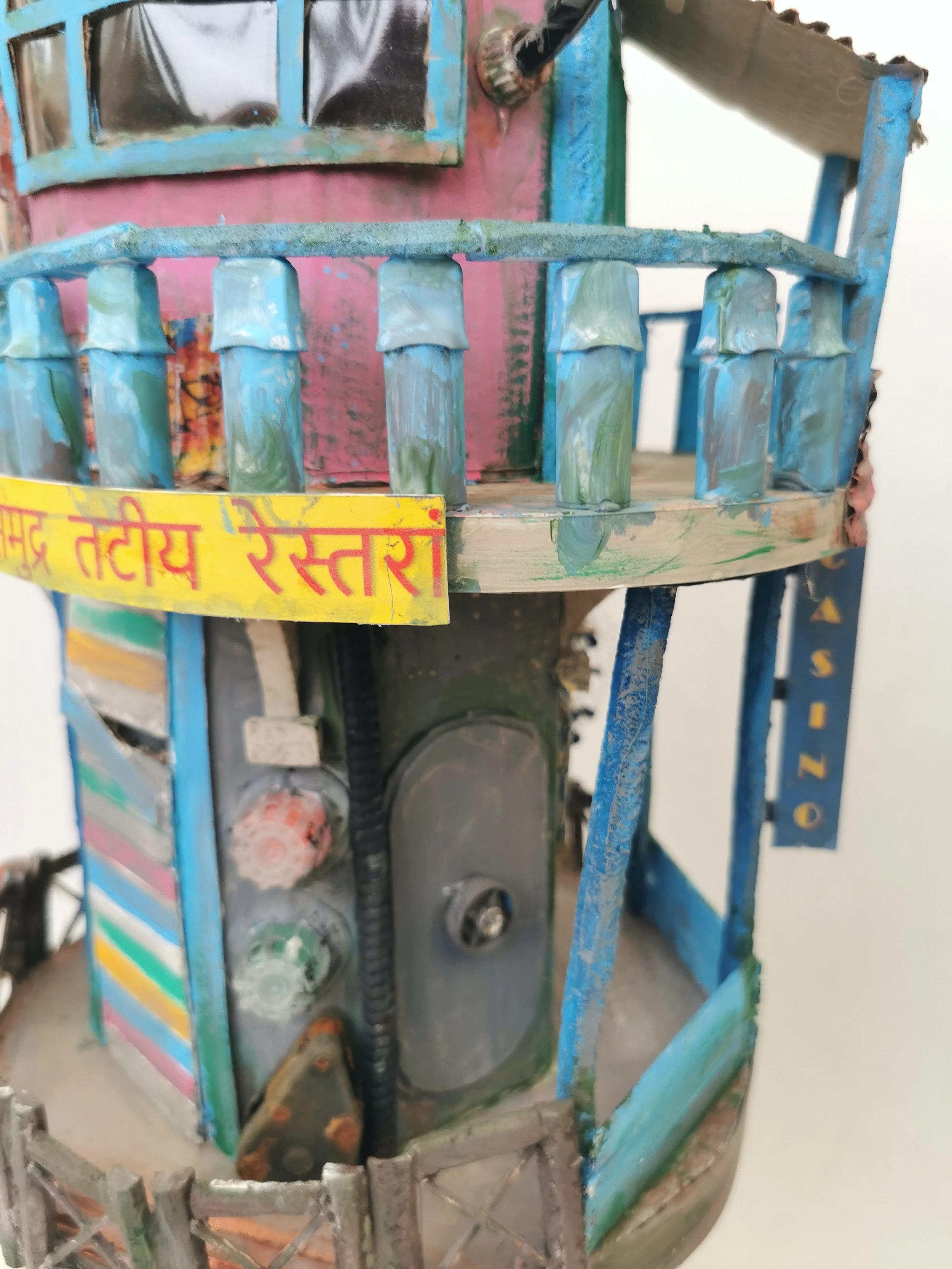 'How we live now 2126' explores miniature worlds 100 years from now when the rising waters and melting ice caps have made living on land impossible, instead people have constructed floating homes or homes that cling to cliffs or rock outcrops. Each p