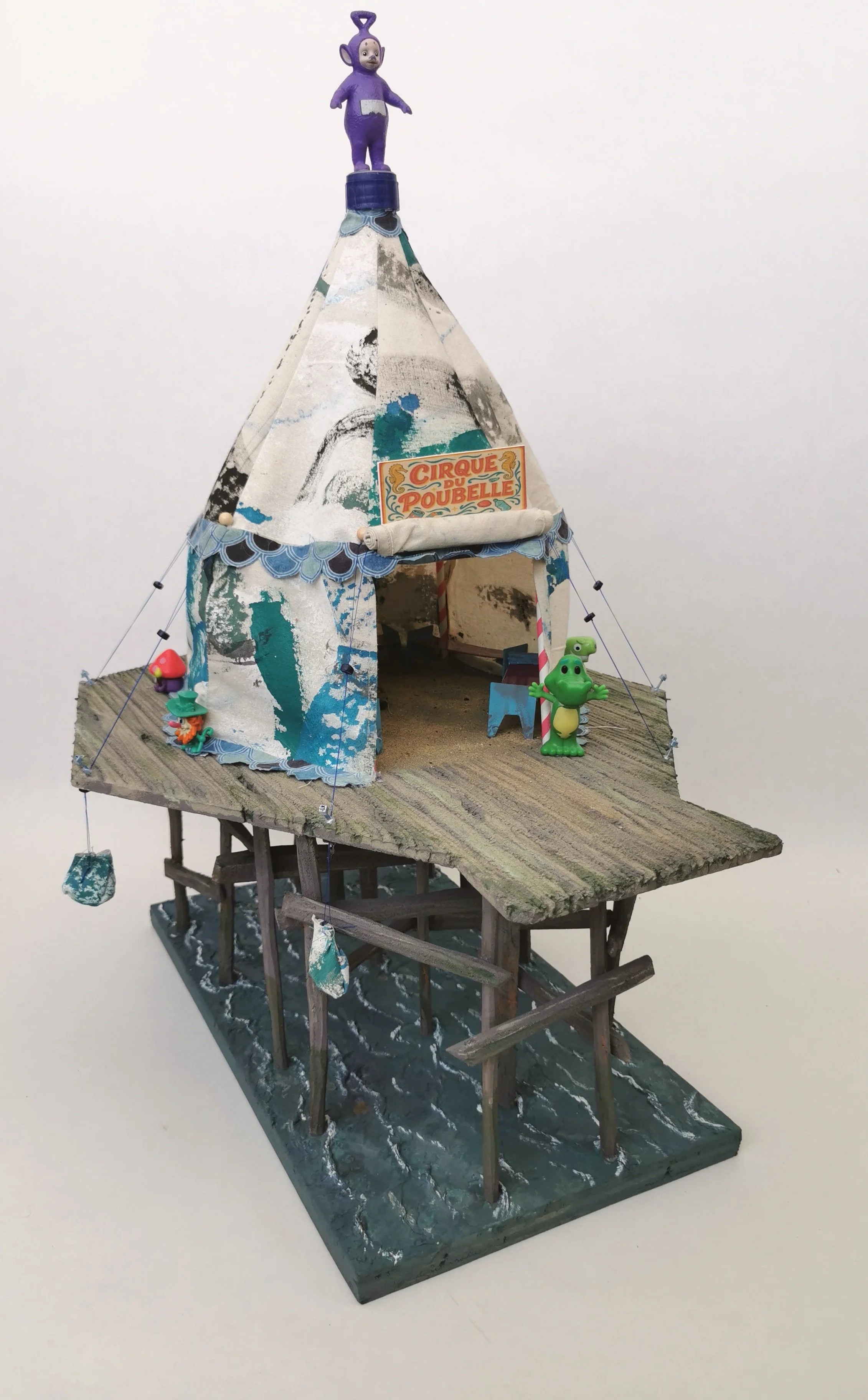 'How we live now 2126' explores miniature worlds 100 years from now when the rising waters and melting ice caps have made living on land impossible, instead people have constructed floating homes or homes that cling to cliffs or rock outcrops. Each p