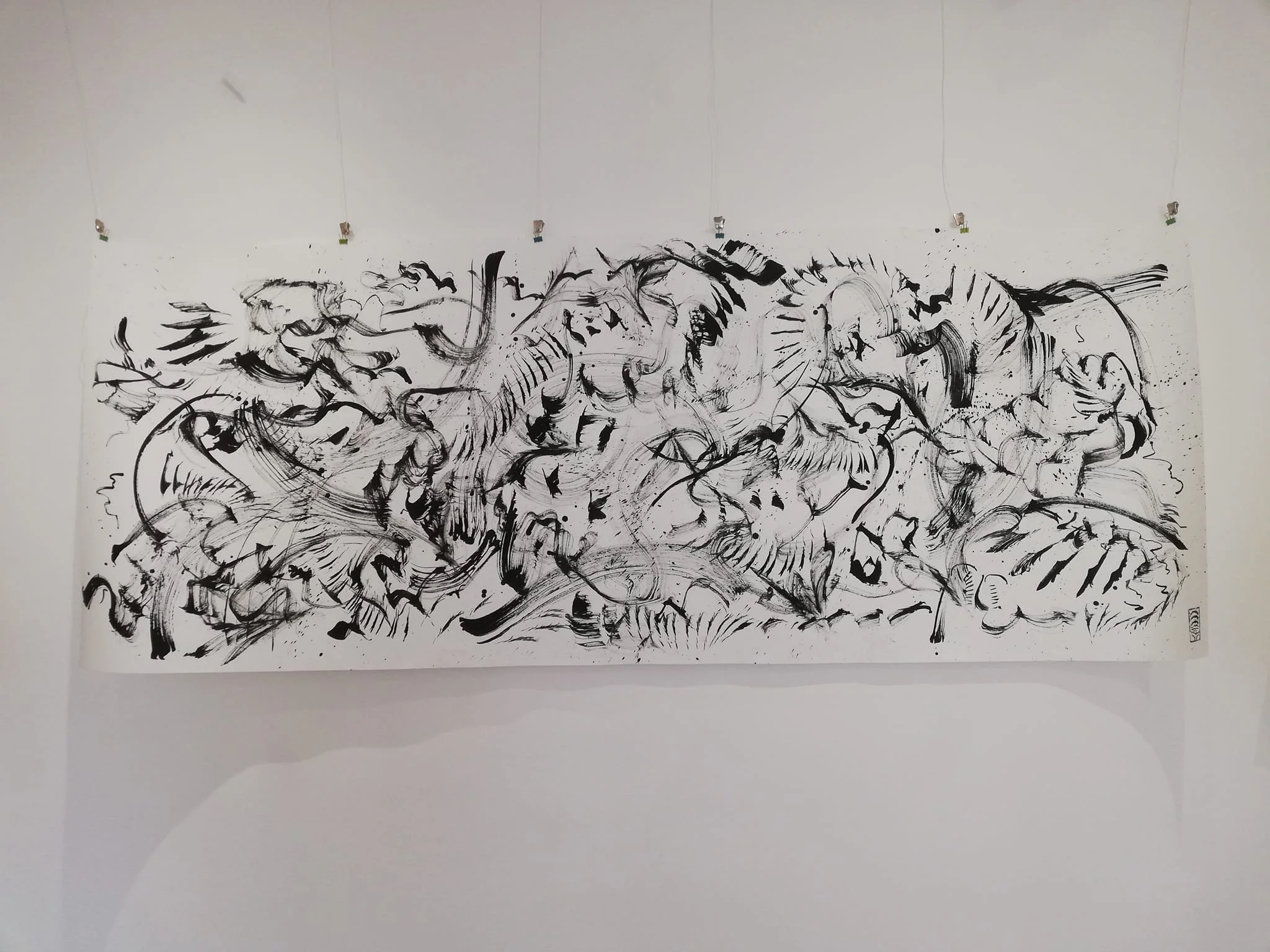 Birdwords/Whalewords. An attempt at creating a written language from bird and whale song.
Image: Corvid-song. Lining paper and chinese ink. Painted using feathers and found object markmaking tools. 3m wide. 2024