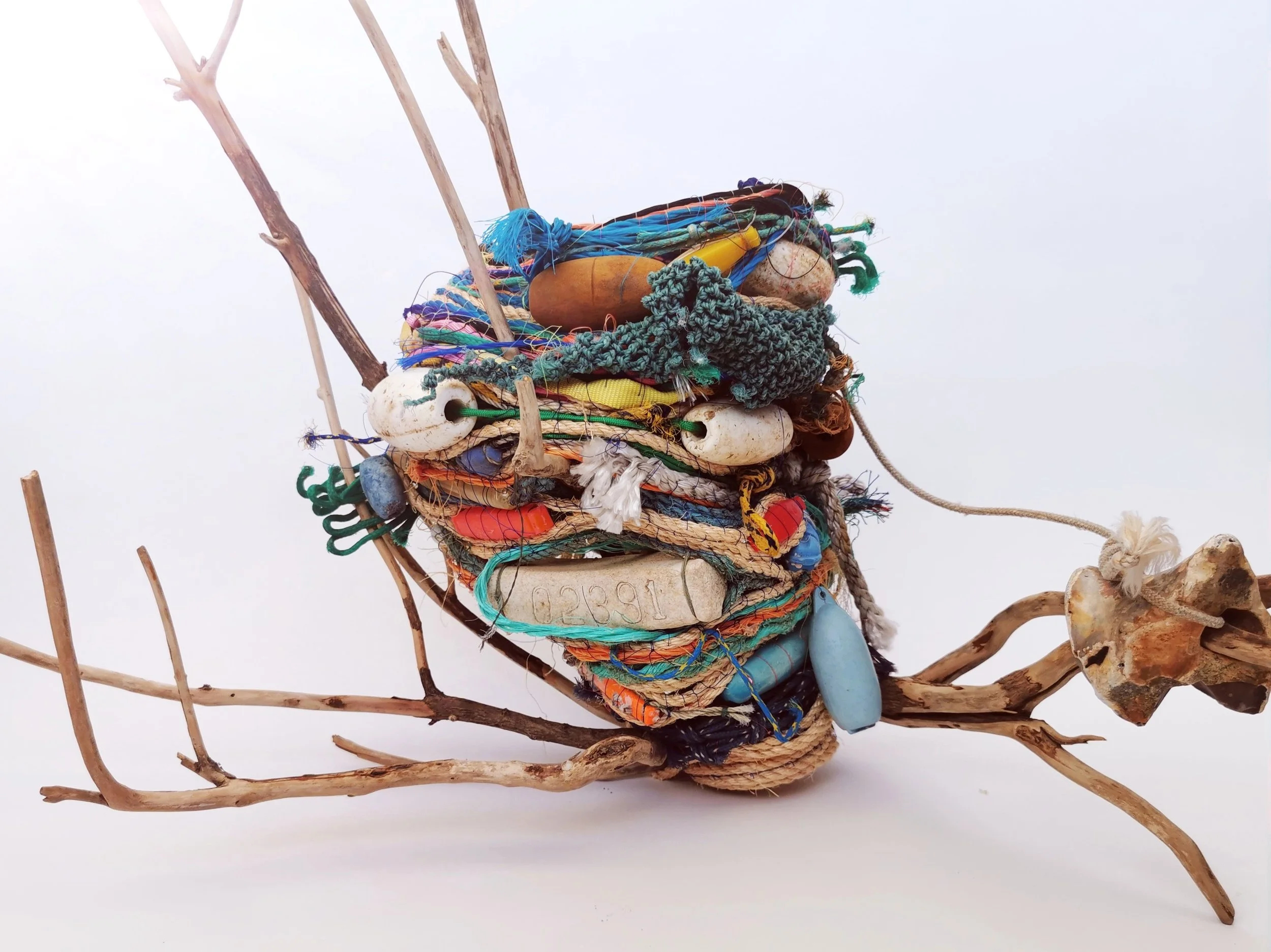 'Ocean Going Vessels' are a series of vases and jugs created entirely from found rope and other flotsam and jetsam found near the artists home and internationally. 