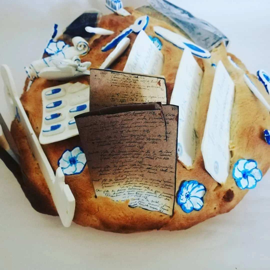 'Weaving Migrants' A year long research into my ancestors, from ancient royalty who owned most of Kent to the Huguenot weavers who were my forbears.
Image: Daily Bread. bread, porcelain and artefact. Based on a bible baked into a loaf of bread to hid