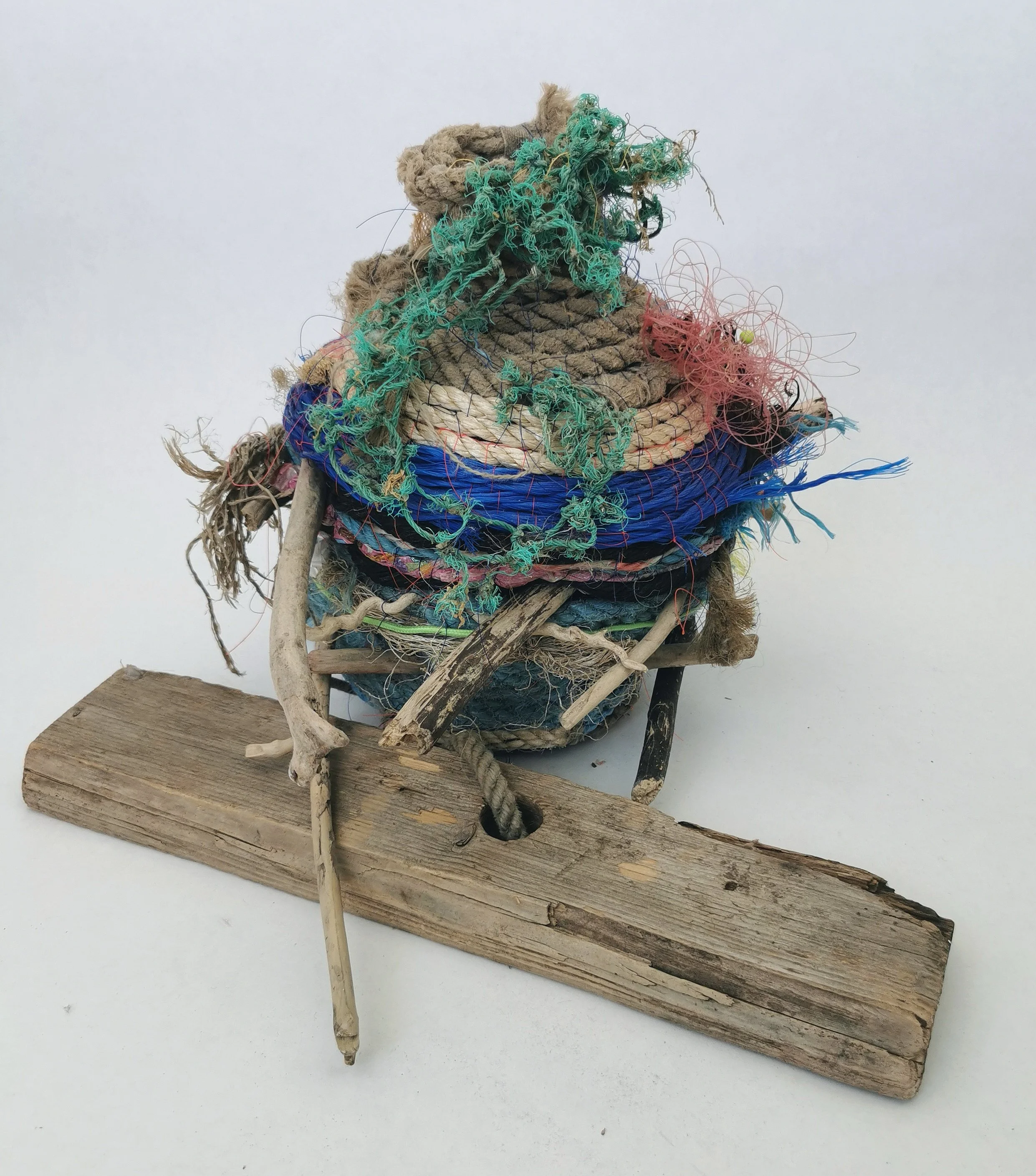 'Ocean Going Vessels' are a series of vases and jugs created entirely from found rope and other flotsam and jetsam found near the artists home and internationally. 