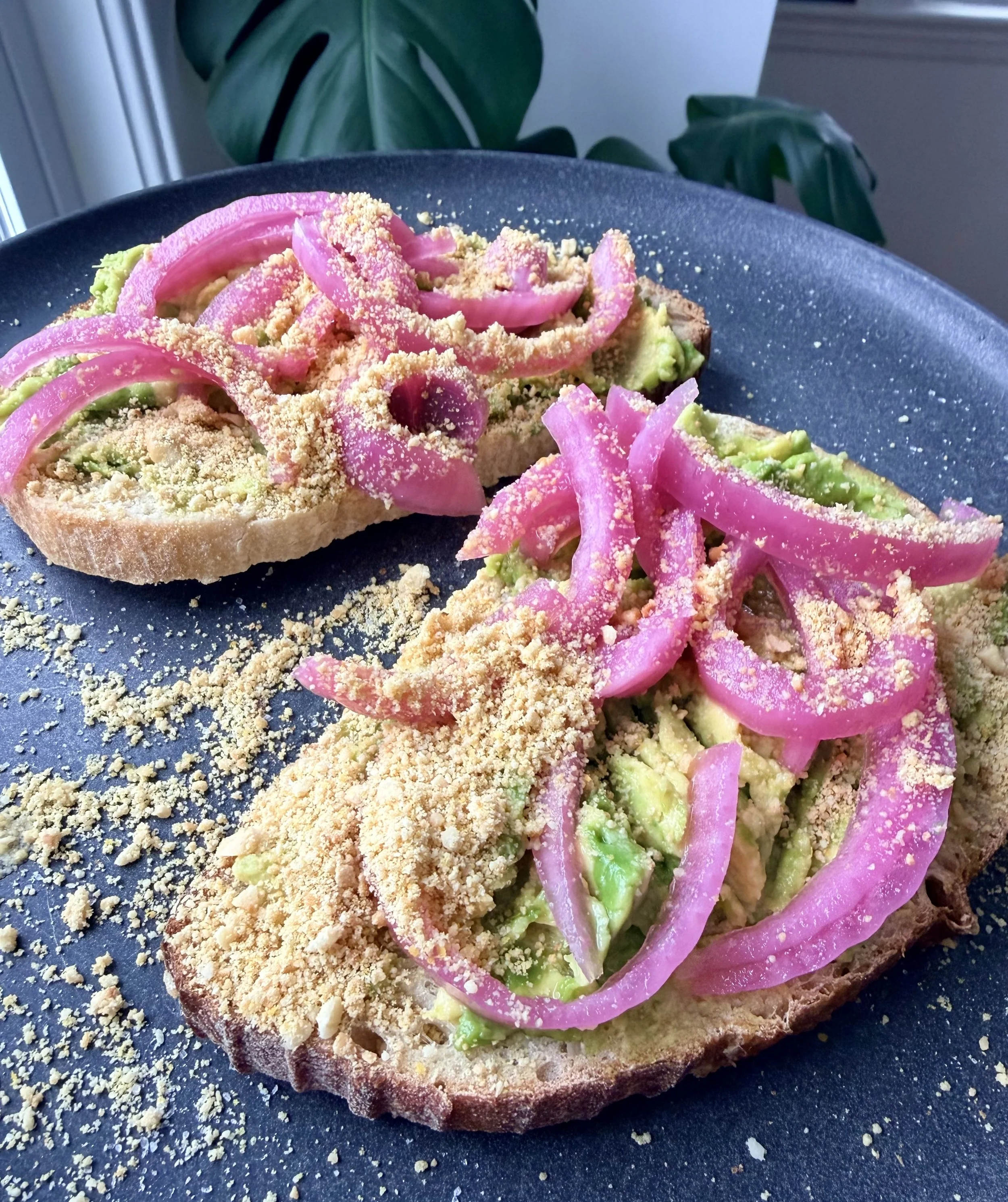 AVOCADO TOAST WITH PICKLED RED ONIONS