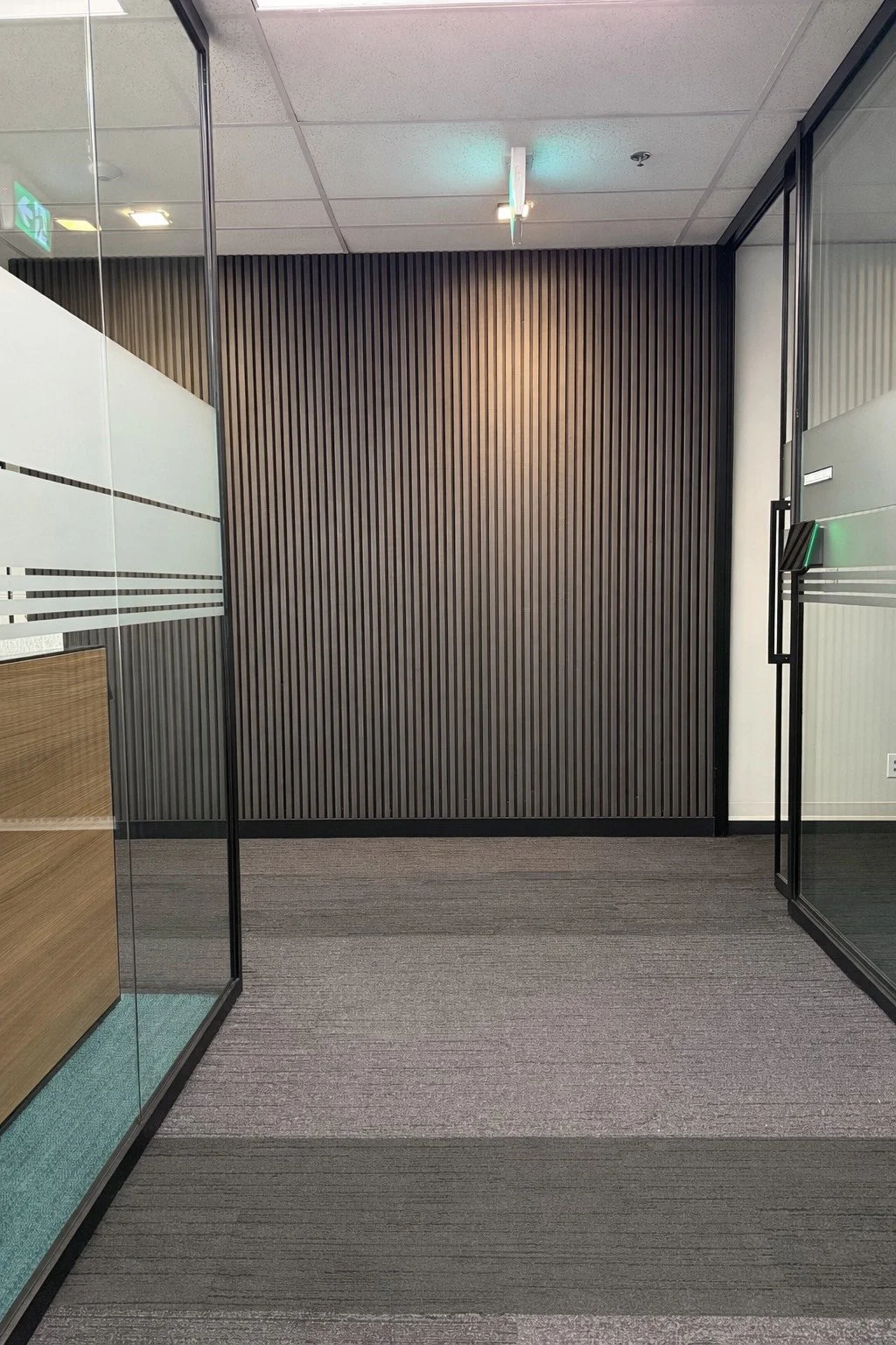 sounds proofing with acoustical wooden slats in noisy office space in Calgary, AB
