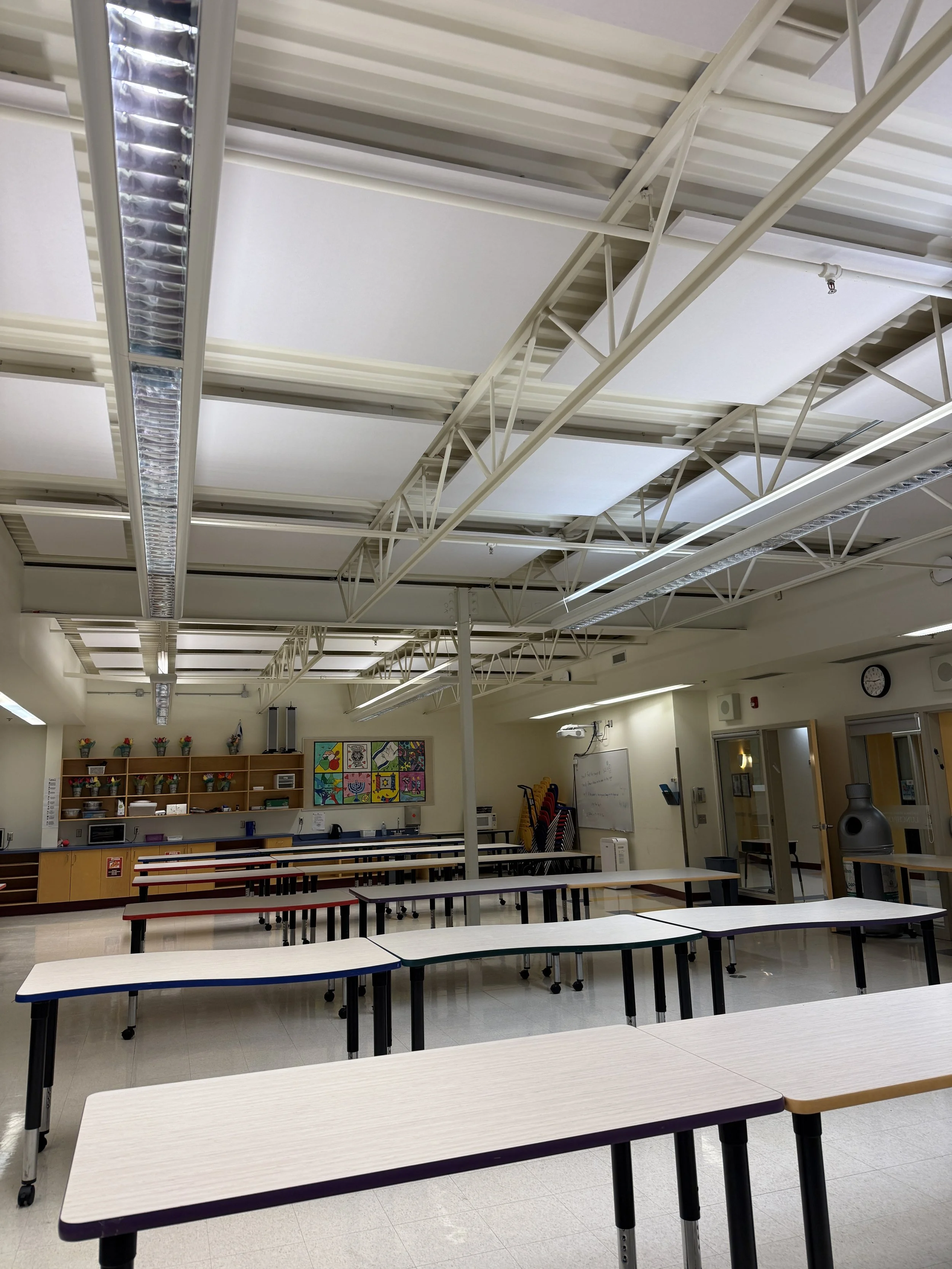 Sound proofing in noisy class room done in Edmonton, AB using acoustic cloud panels for treatment