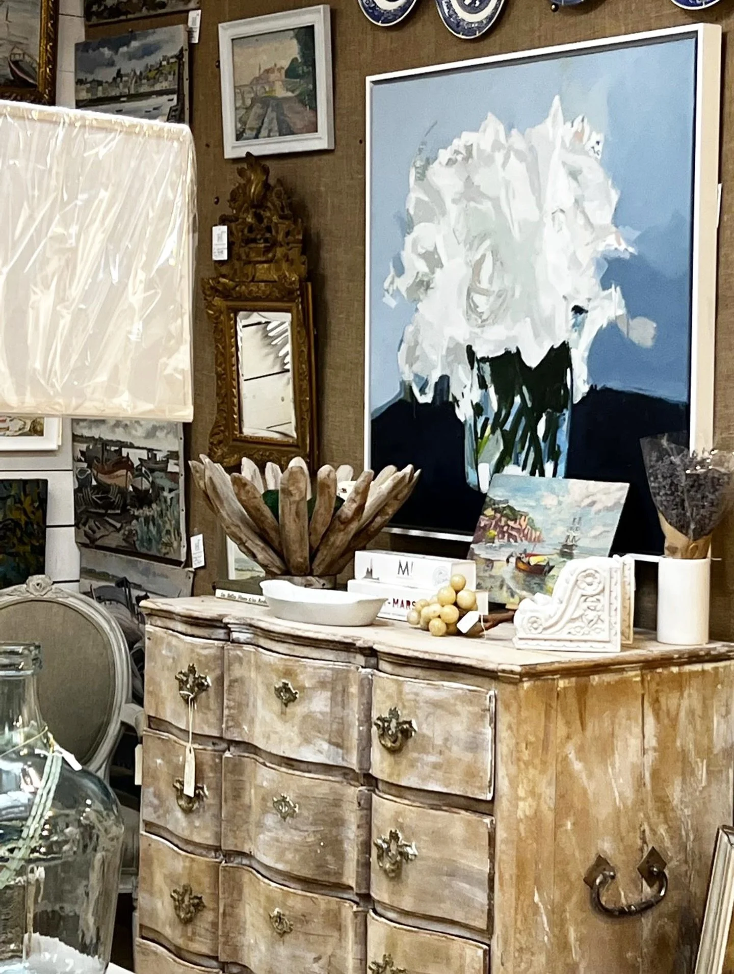 Thursday throwback to this booth view from a year or two ago, with one of my abstract floral paintings hanging above an antique French chest of drawers with the most beautiful curved lines. 

#ThrowbackThursdayPost #BoothView #Harper_Hughes_Home