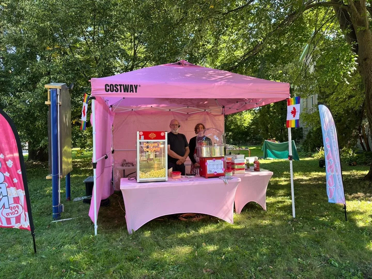 Beautiful Day in the Neighbourhood Gratitude #3: Dragon's Delights added a beautiful splash of pink to the front lawn once they got their tent set up. Then Dave and Kiran spent the whole day serving the neighbourhood free popcorn, hotdogs and cotton 