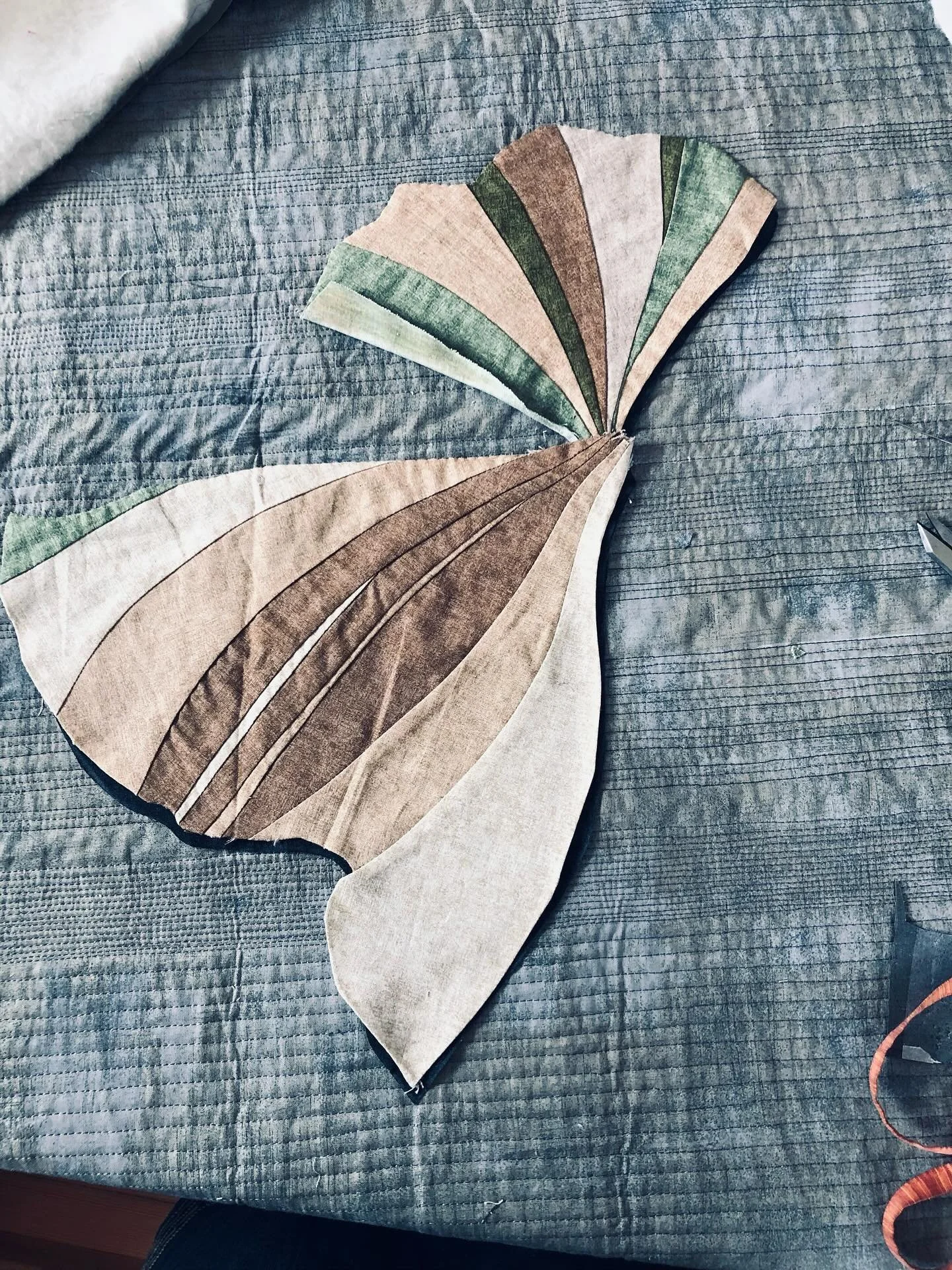 Doing shadows with fabric was new to me but I enjoyed so much trying this technique and mainly seeing the effect!

This piece has been in the works for several months now. I am in a mentorship program with SAQA (Studio Art Quilt Associates) it has be