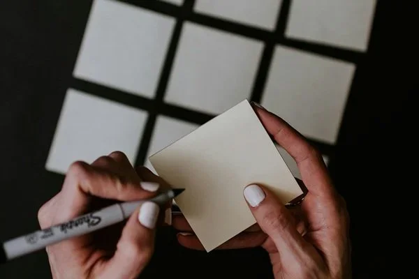 Make Space blog graphic reading “Beyond the Stuff: 5 Time-Smart Ways to Organize Your Home and Mind” with a smartphone on a soft pink background.