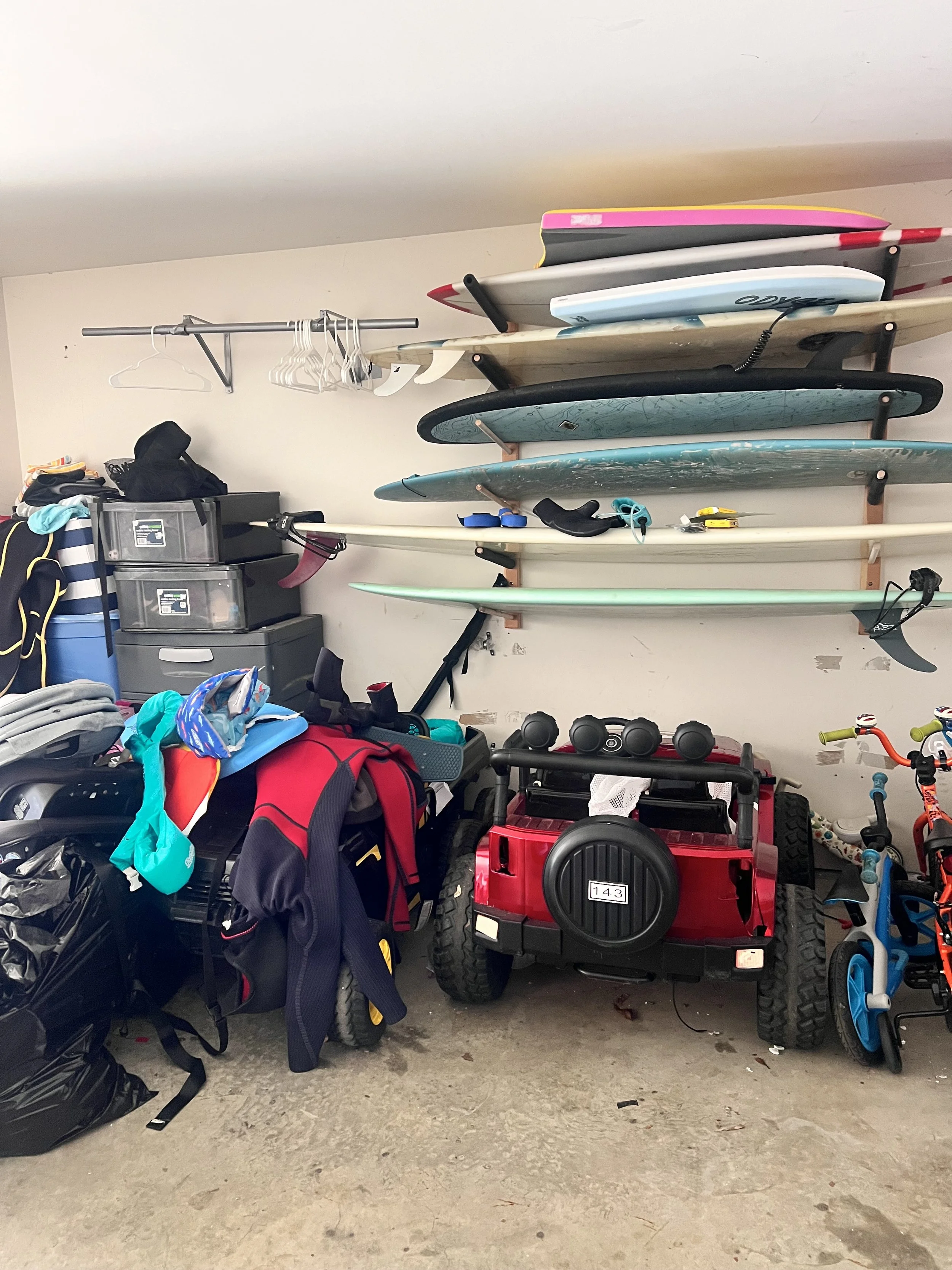 Cluttered garage before professional organizing service in Monmouth County NJ