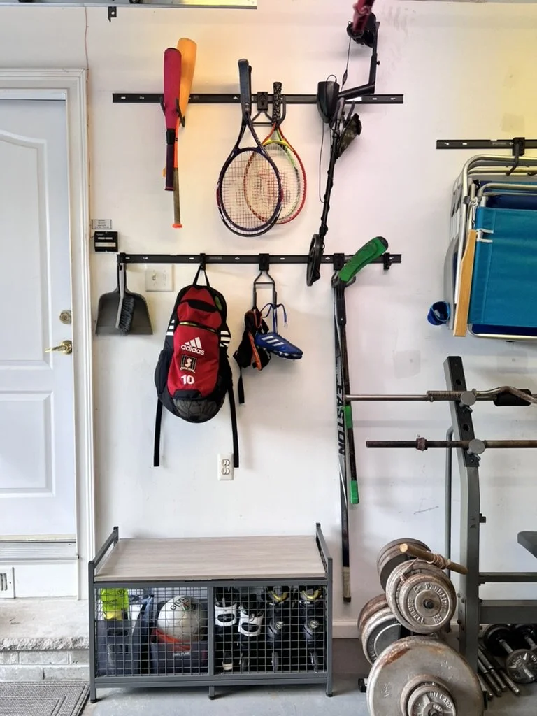 Entryway storage solution built into a hallway nook by Make Space Organizing in central New Jersey