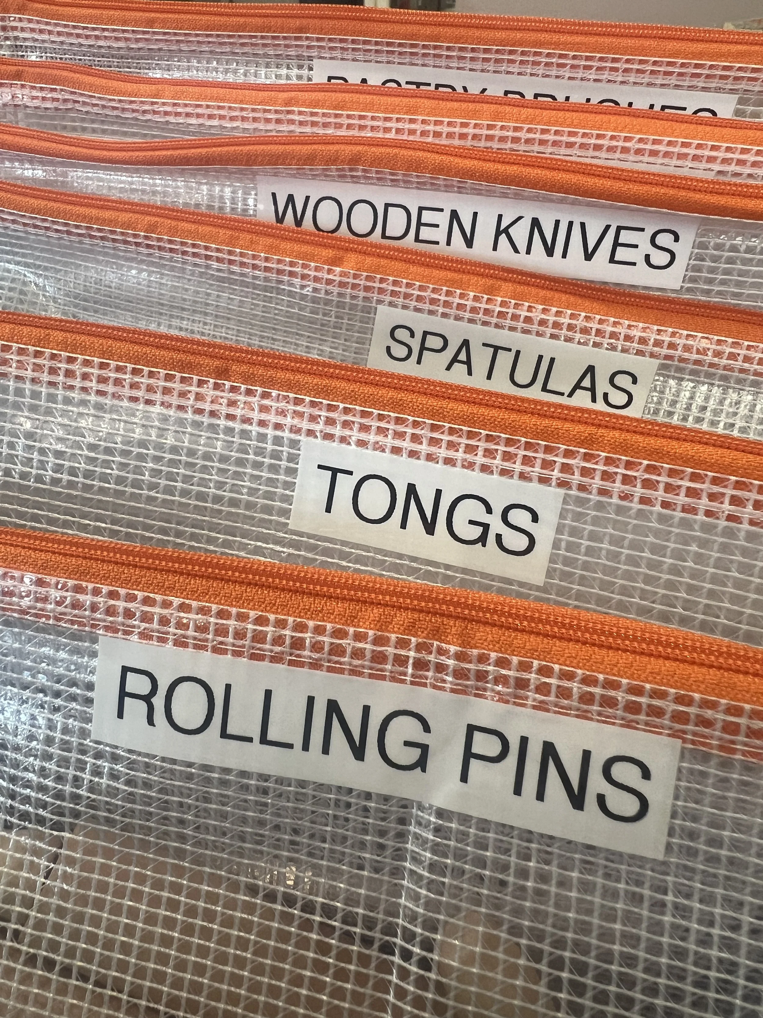 Labeled culinary supply pouches organized for classroom use — professional small business organizing NJ — Make Space