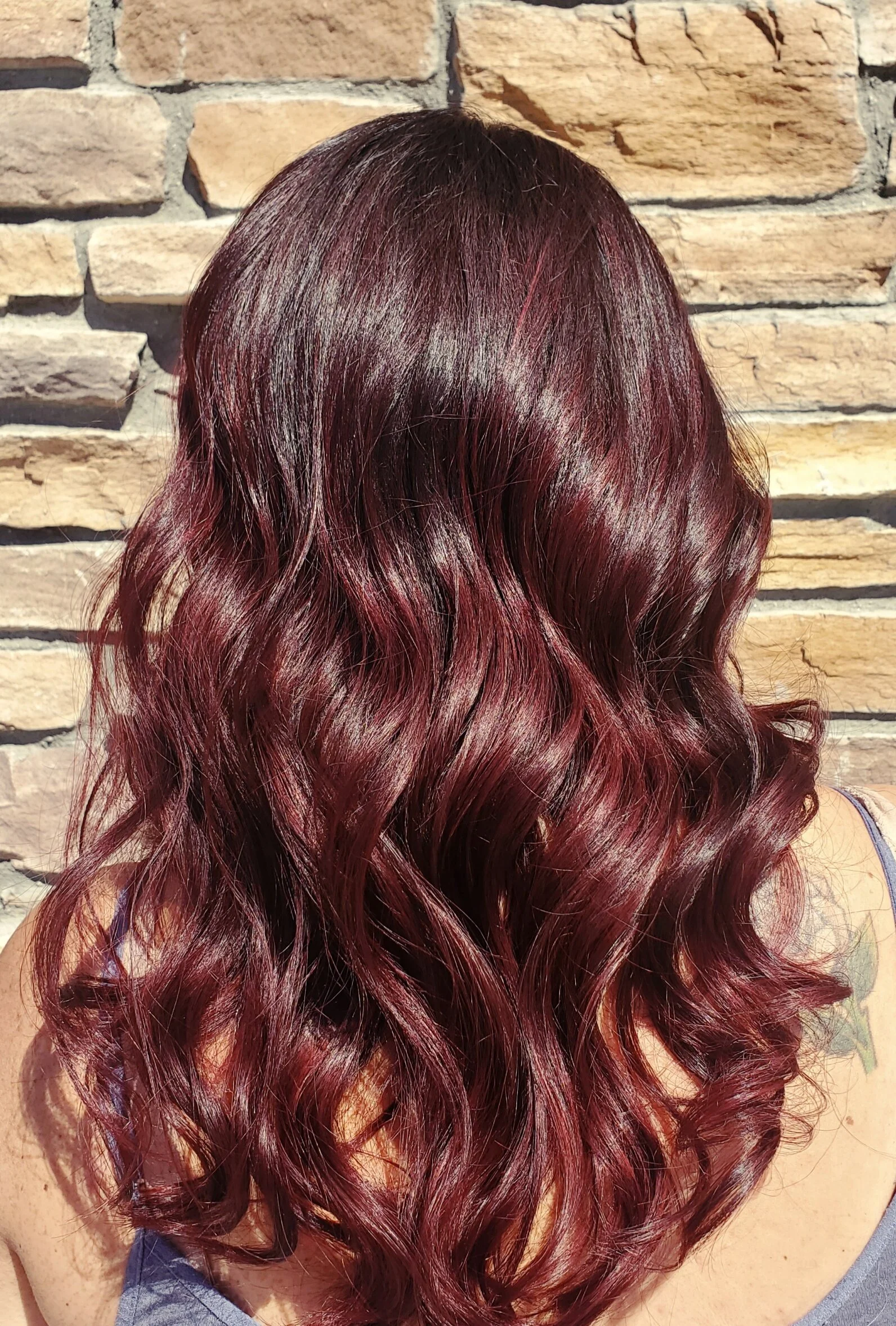 Allover color with previously highlighted hair Layered cut