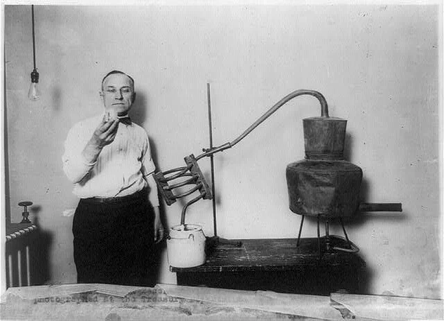 Photograph of a confiscated moonshine liquor still photographed by the Internal Revenue Bureau at the Treasury Department, Washington, D.C. Courtesy of the Prints and Photographs Division, Library of Congress, Washington, D. C. - wikimedia commons