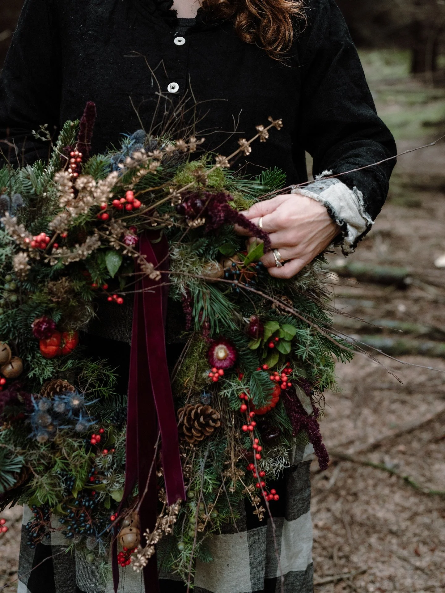 Loving this wreath by @brambleandwild that I got to photograph last week!

Clothes by the gorgeous @an_acre_of_land 

#christmaswreath #wreathseason #photographyforflorists