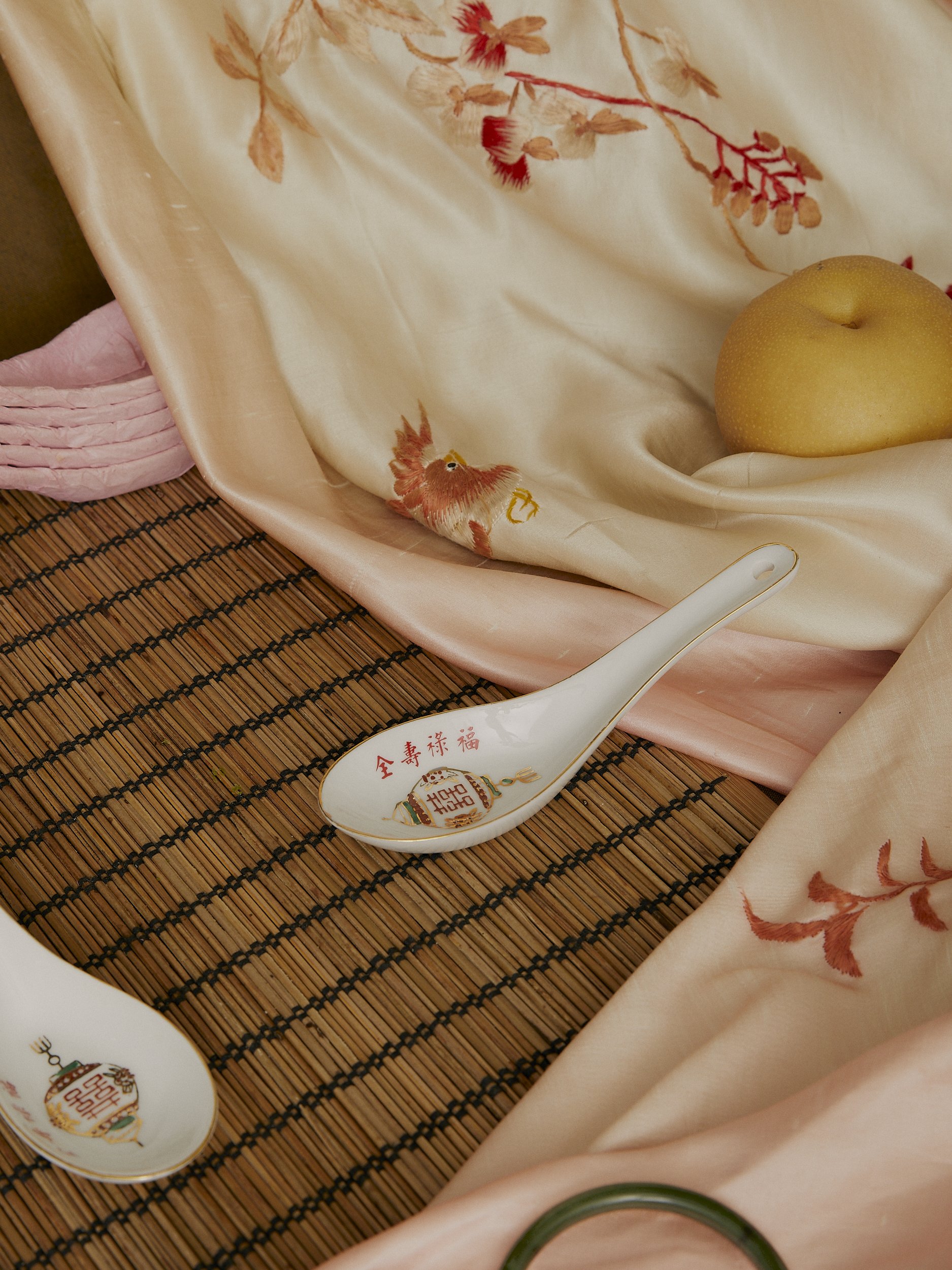 chinese spoon on fabric and mat