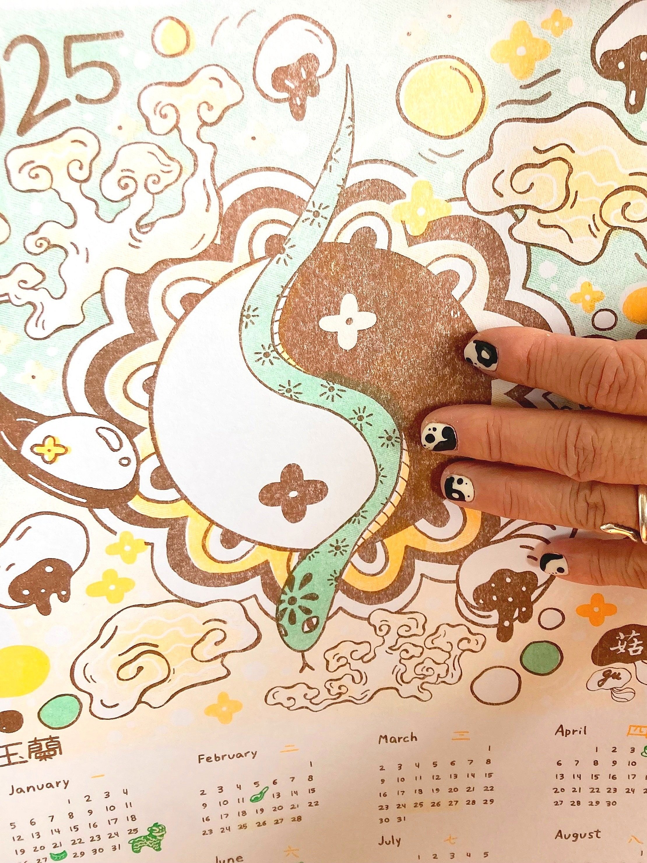 SnakeCalendarCloseupNails.jpg