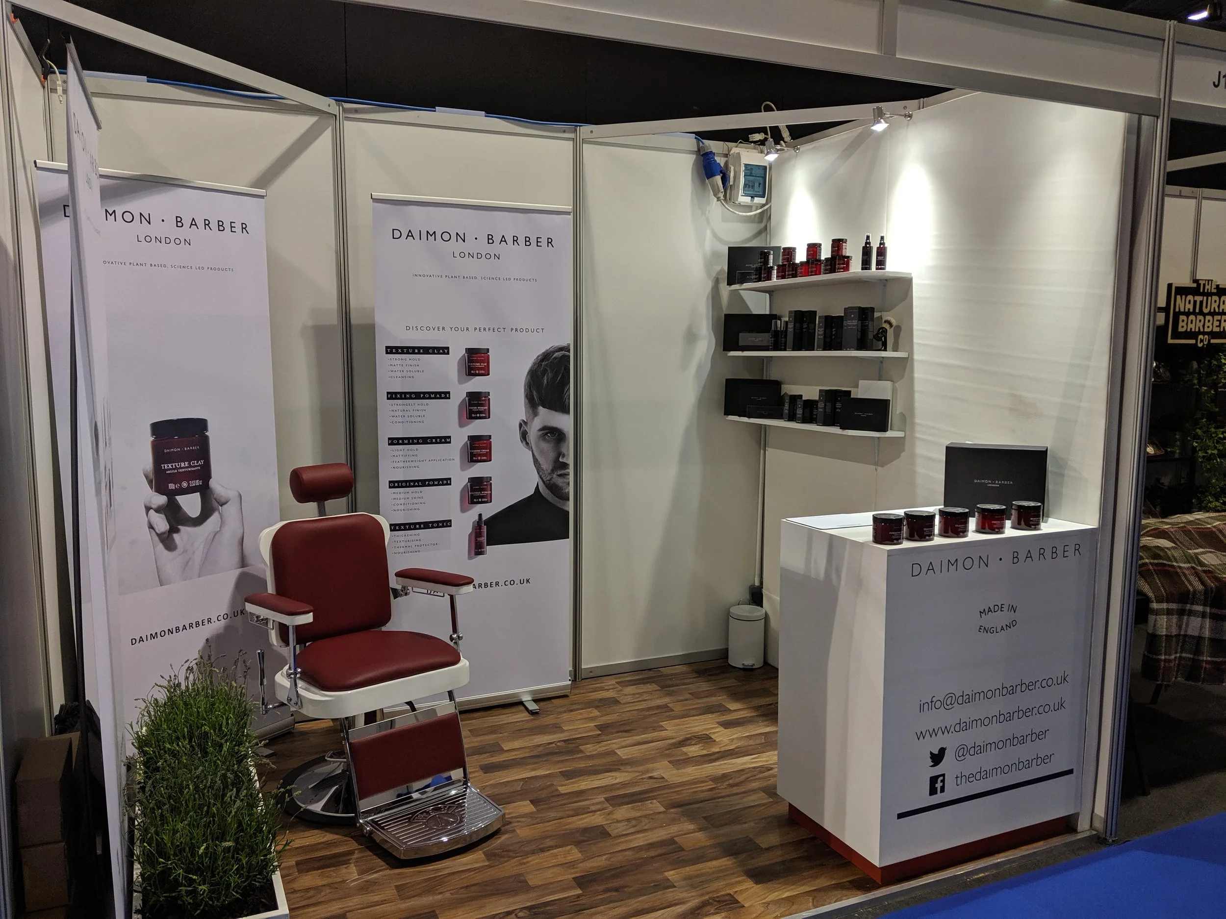 A pop up exhibition stand in a shell scheme structure in Birmingham for Daimon Barber.