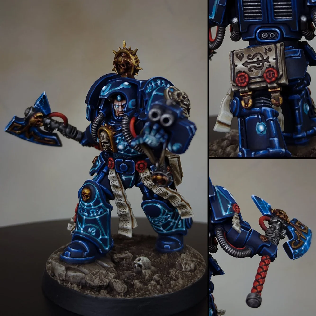 A detailed miniature figure of a blue armored warrior with skull accents, holding an axe and a gun, standing on a rocky base with skulls and bones, with additional close-up views of the figure's armor, weapons, and back detailed with symbols and acce