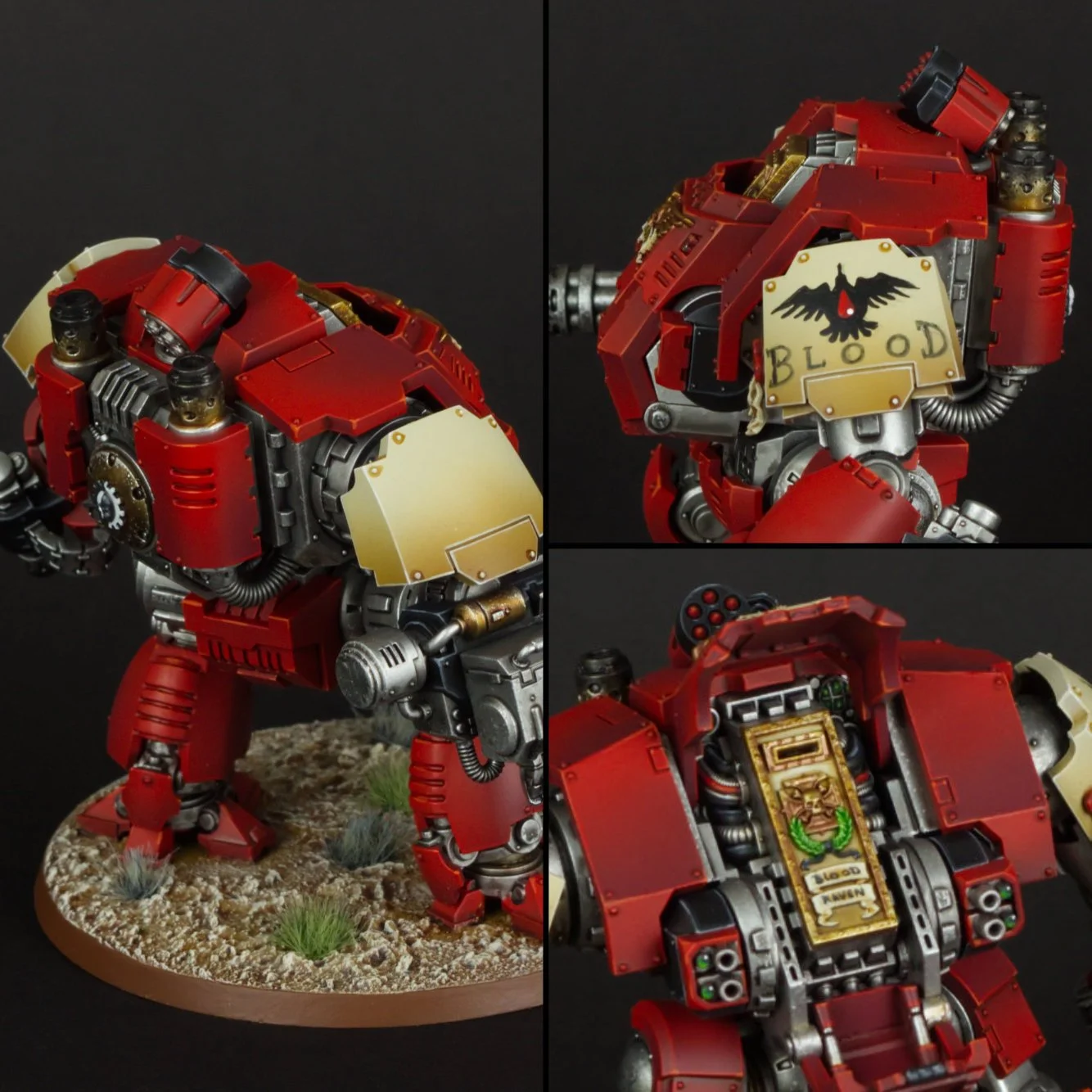 A detailed model of a red armored war machine with mechanical parts, emblems, and weapons, displayed on a base with a black background.