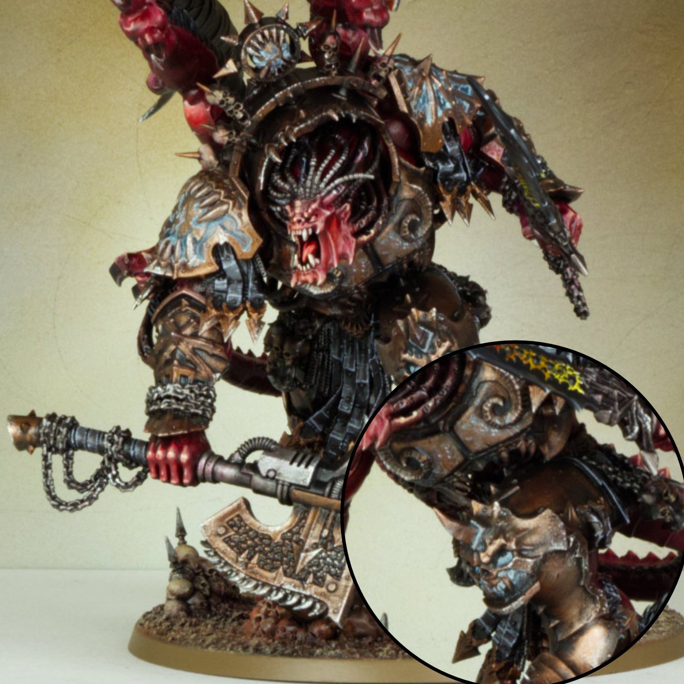 A highly detailed fantasy miniature of a monstrous warrior with a fierce face, sharp teeth, and long black braided hair. The figure is heavily armored with spiked and decorative armor, holding a large, ornate axe. The armor features intricate designs