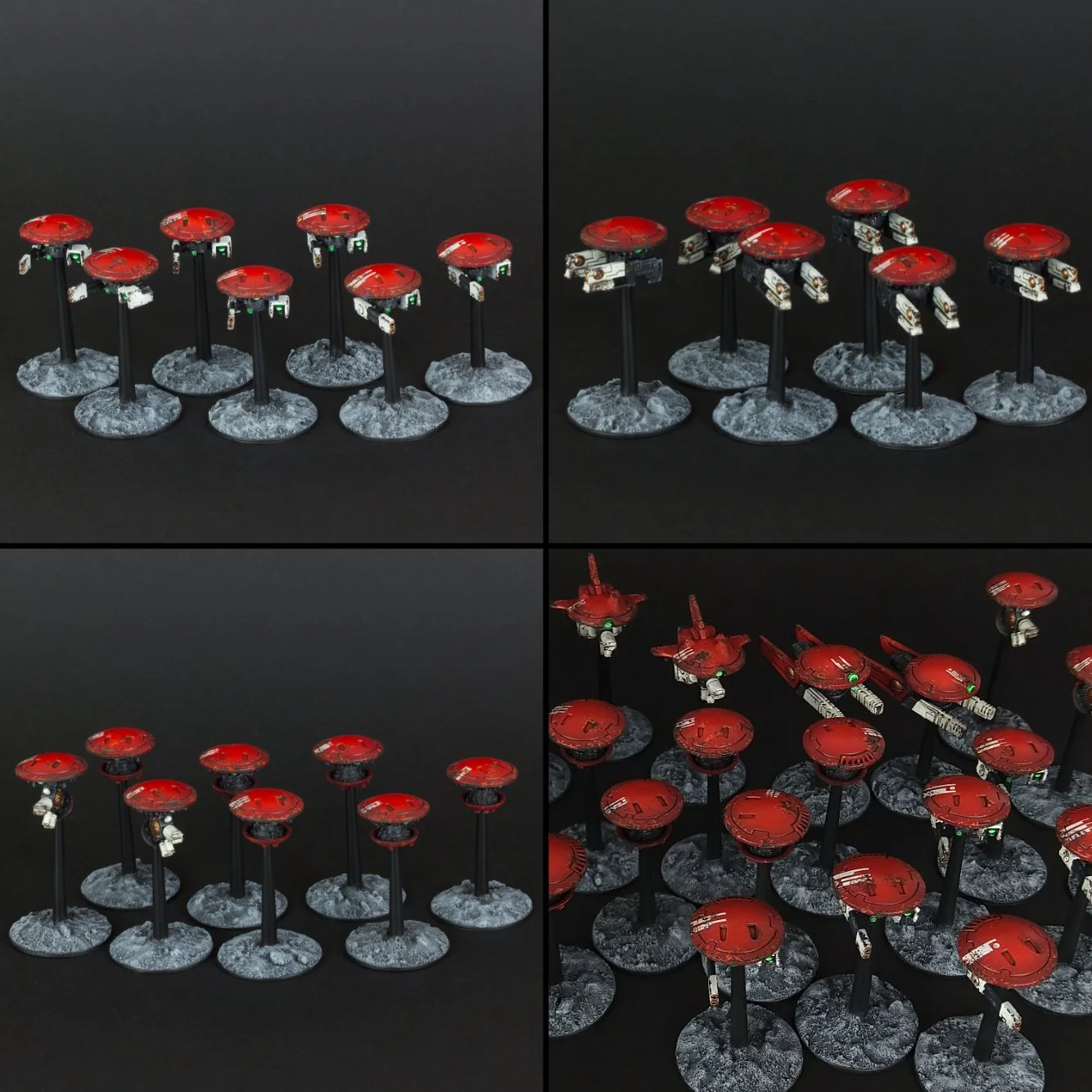 Miniature red spaceships with white and black details and green lights, arranged on round bases against a black background, displayed from different angles.