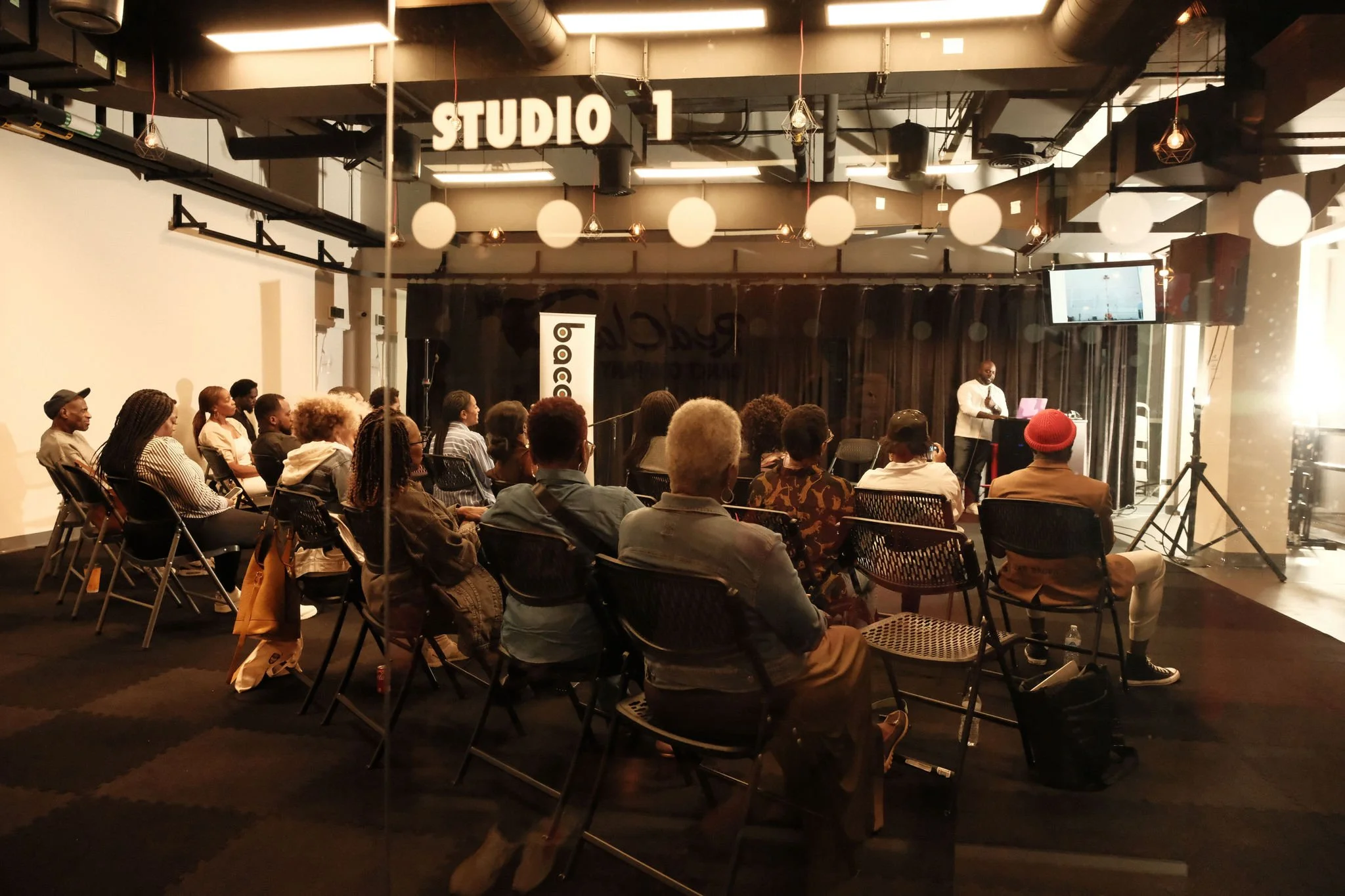 Studio 1 rental with large group of community members