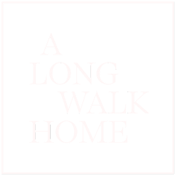Text that reads 'A LONG WALK HOME' on a black background