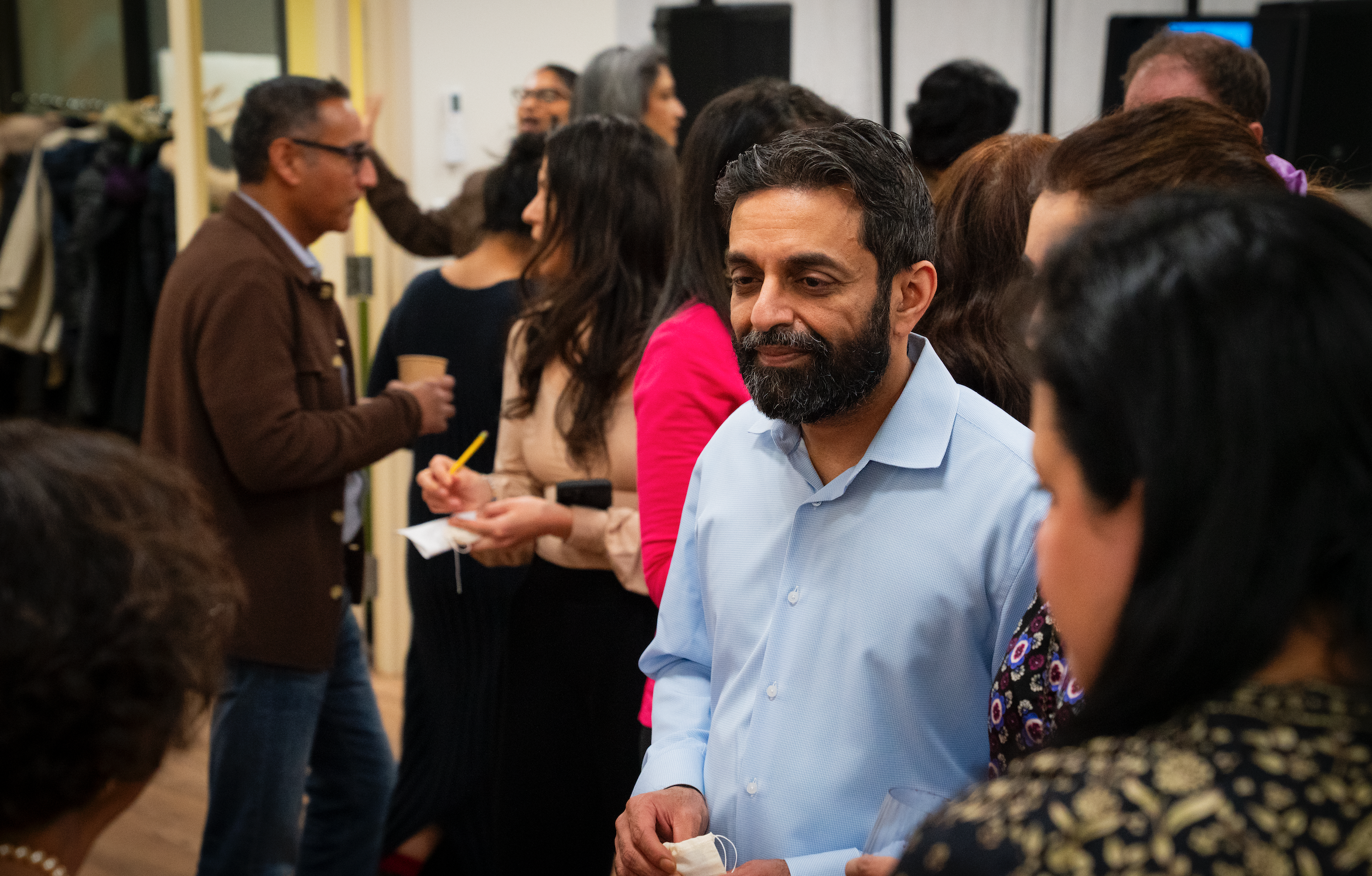 Guests mingling during opening reception