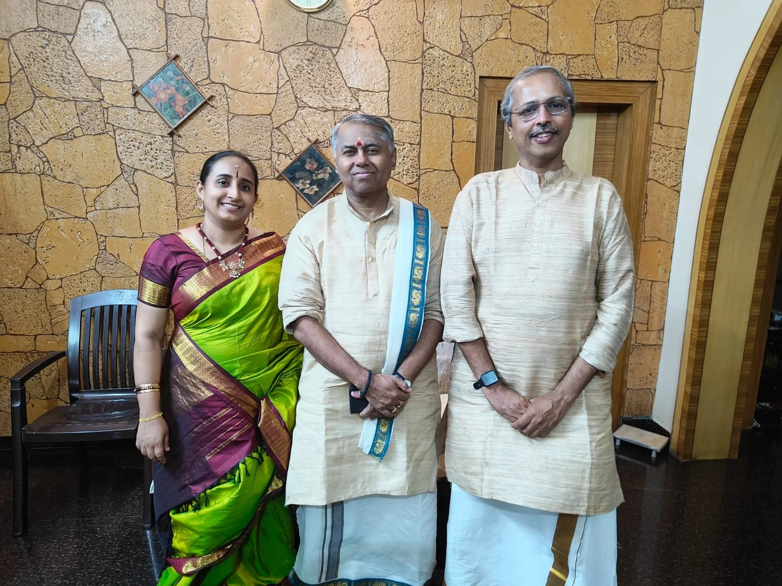 2 men and 1 women musicians standing